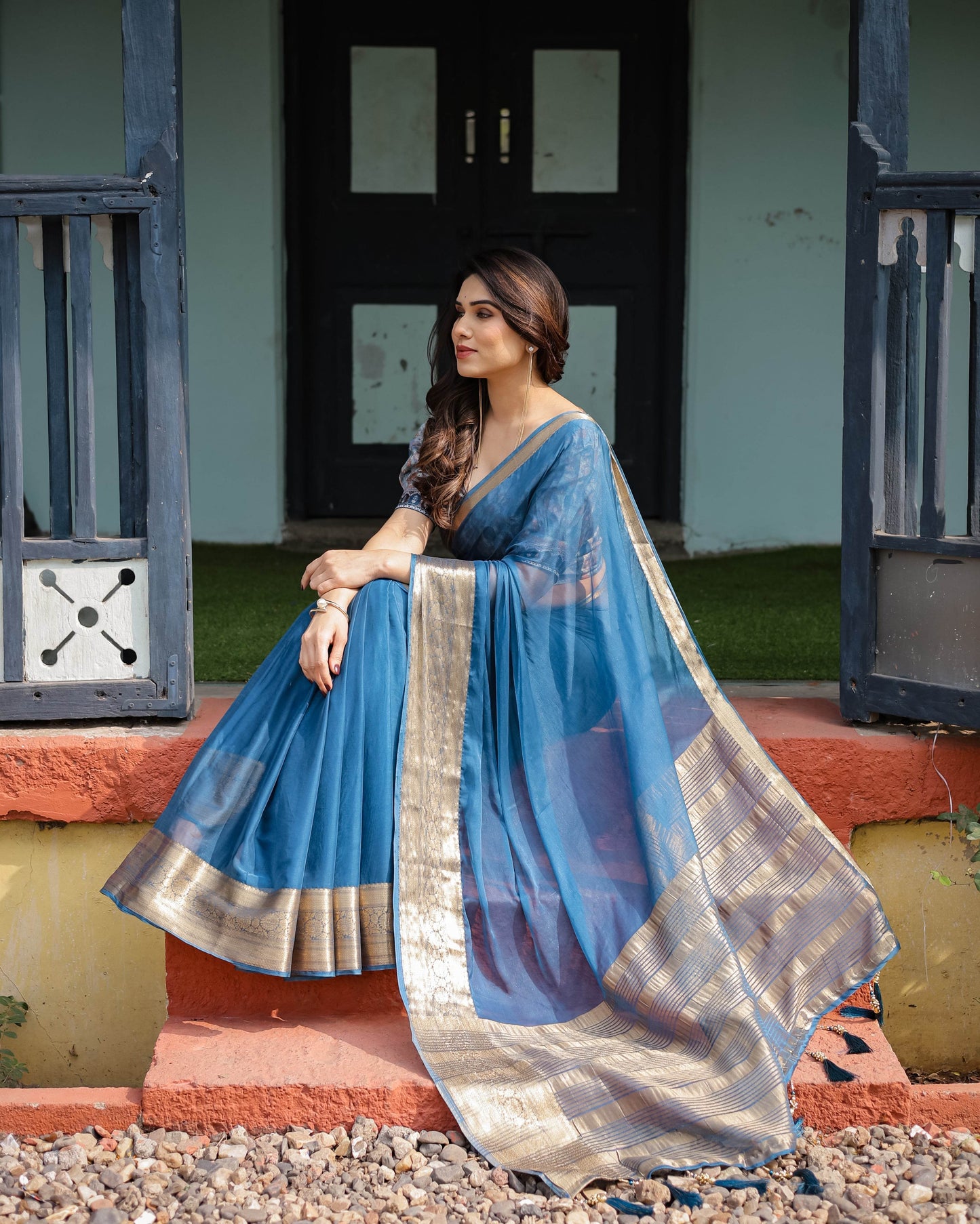 Vibrant Peacock Blue Plain Chiffon Saree with Gold Zari Border, Floral Printed Blouse & Tassel Accents - SEEANS