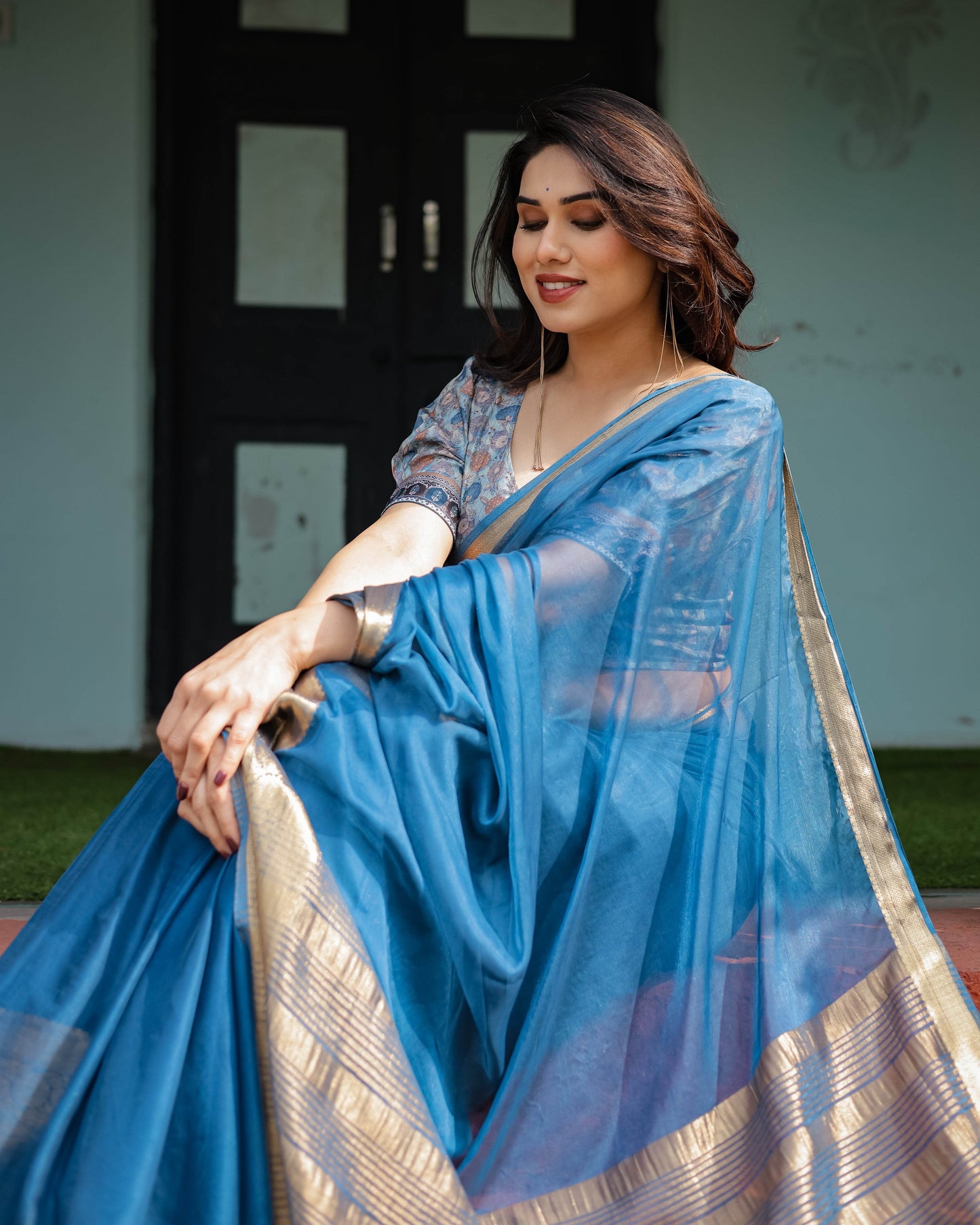 Vibrant Peacock Blue Plain Chiffon Saree with Gold Zari Border, Floral Printed Blouse & Tassel Accents - SEEANS