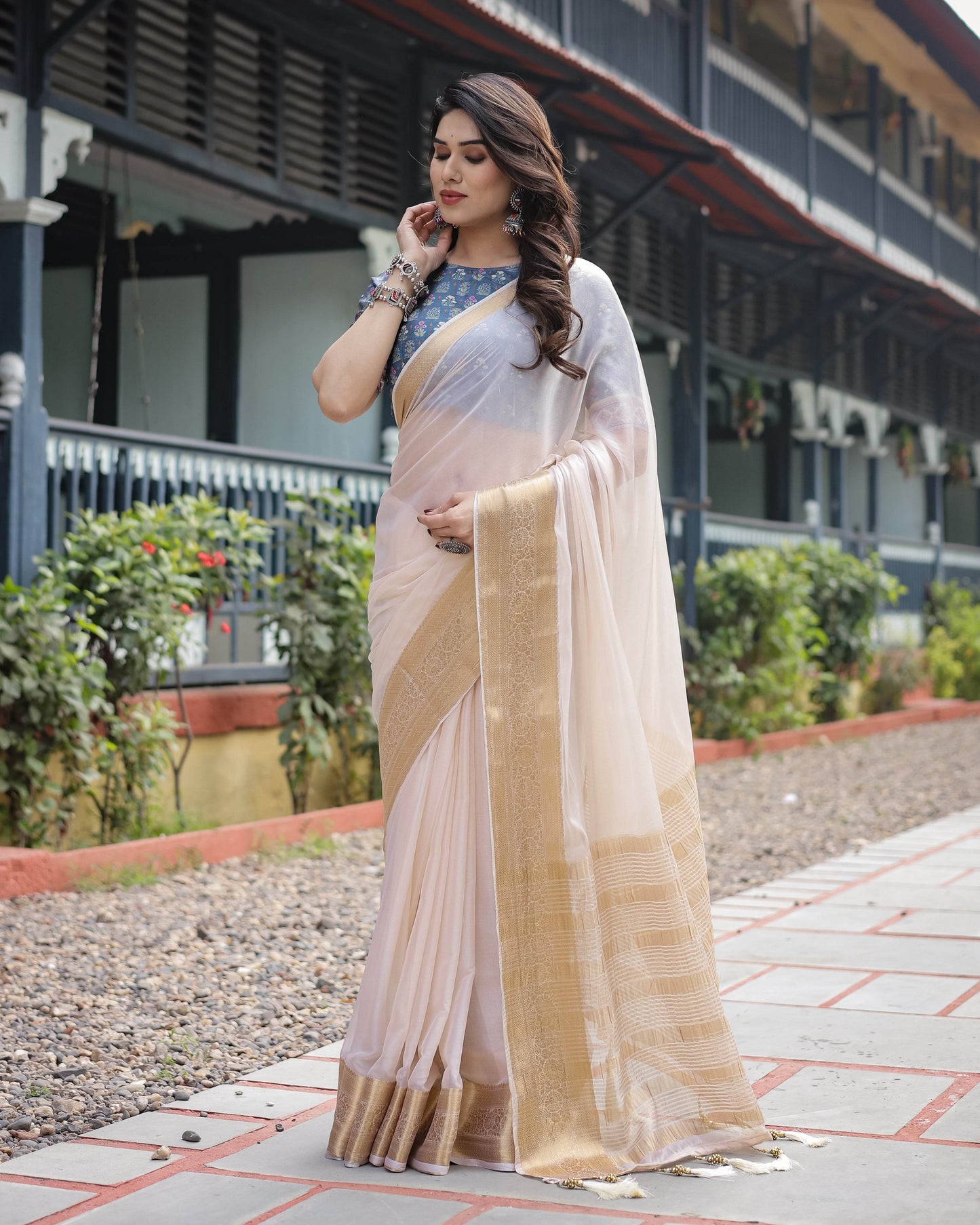 Ivory White Plain Chiffon Saree with Gold Zari Border, Floral Printed Blouse & Tassel Detailing - SEEANS