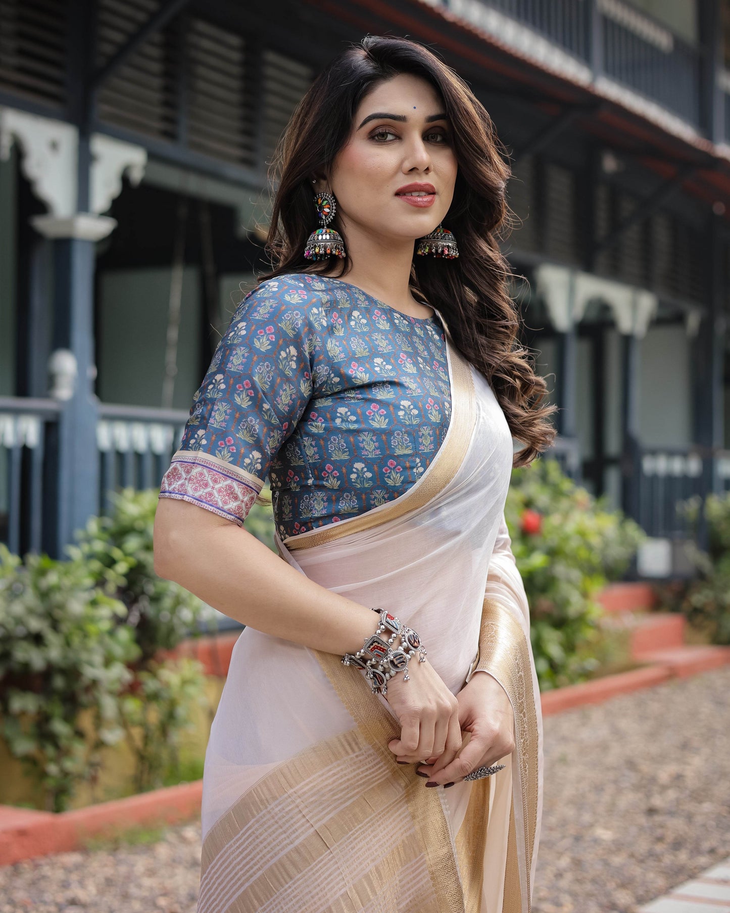 Ivory White Plain Chiffon Saree with Gold Zari Border, Floral Printed Blouse & Tassel Detailing - SEEANS