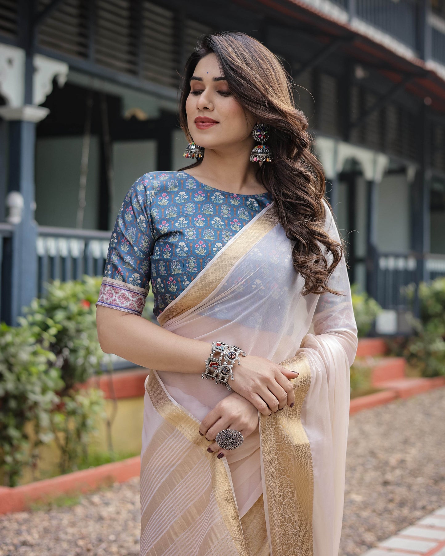 Ivory White Plain Chiffon Saree with Gold Zari Border, Floral Printed Blouse & Tassel Detailing - SEEANS