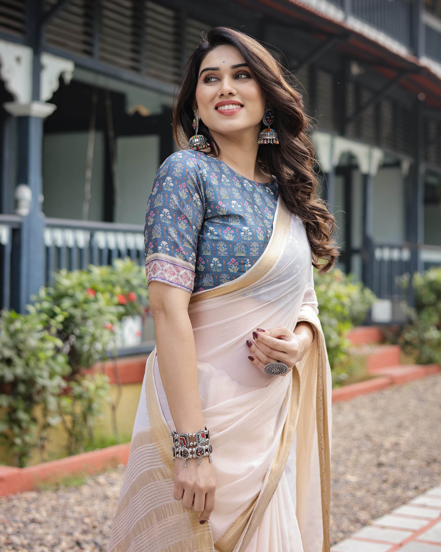 Ivory White Plain Chiffon Saree with Gold Zari Border, Floral Printed Blouse & Tassel Detailing - SEEANS