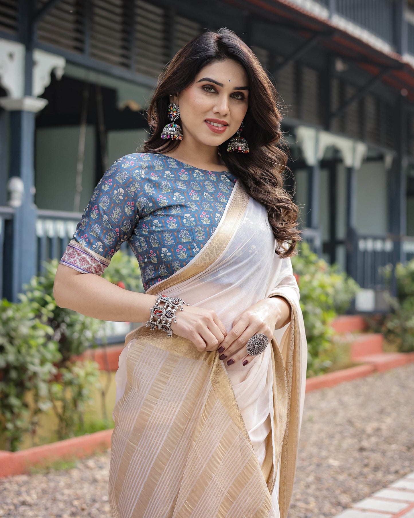 Ivory White Plain Chiffon Saree with Gold Zari Border, Floral Printed Blouse & Tassel Detailing - SEEANS