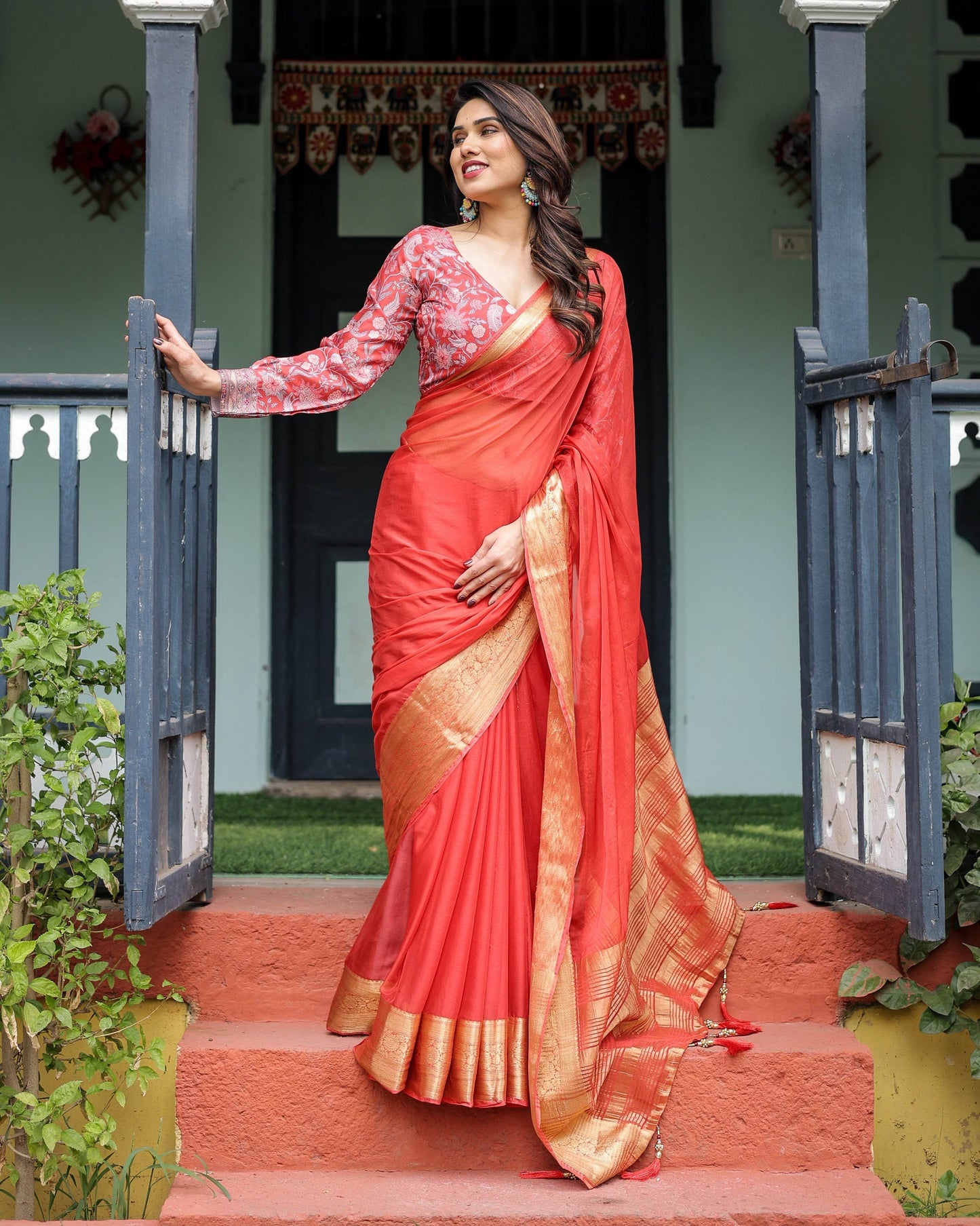 Fiery Red Plain Chiffon Saree with Gold Zari Border, Full-Sleeve Floral Blouse & Tassel Detailing - SEEANS
