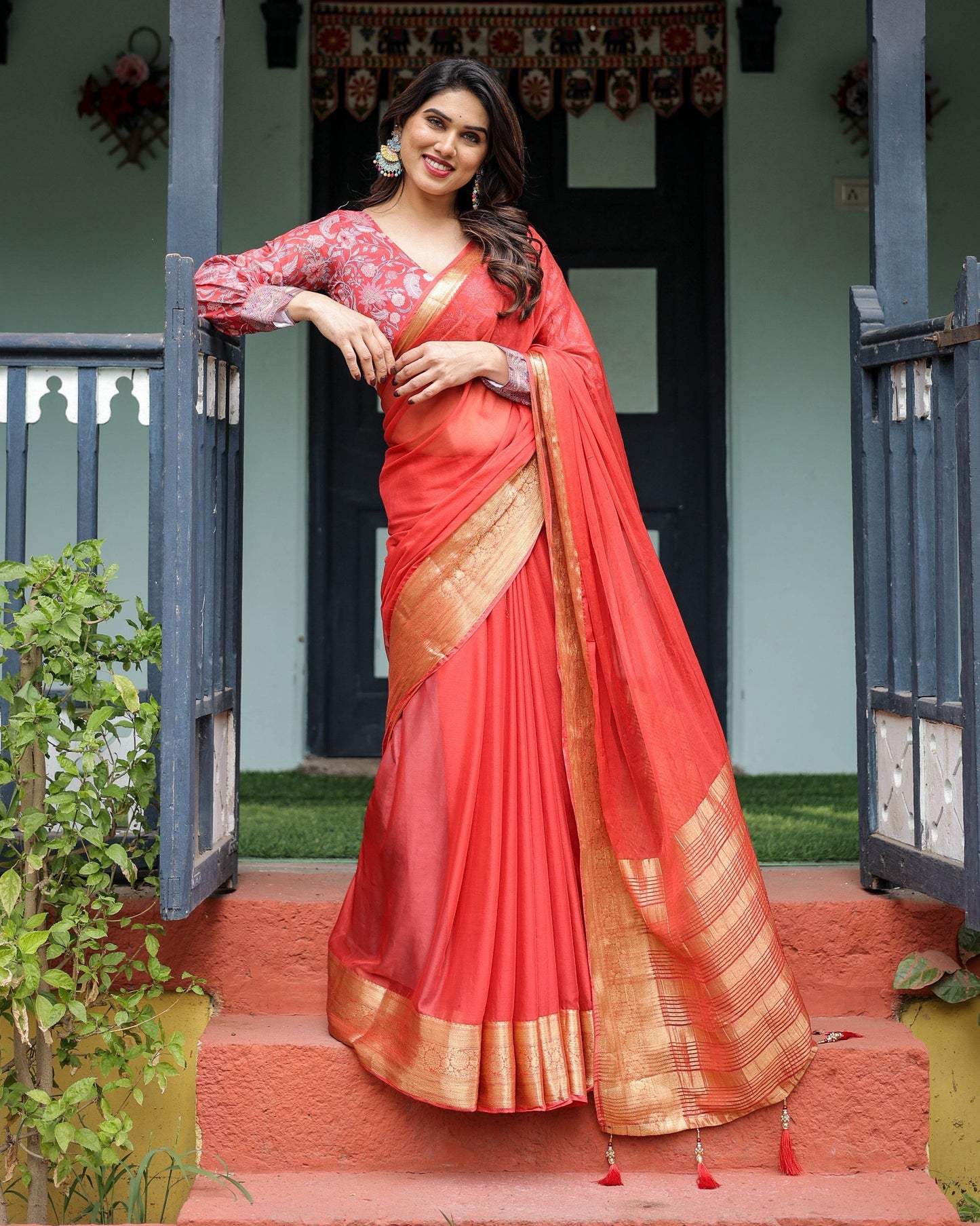 Fiery Red Plain Chiffon Saree with Gold Zari Border, Full-Sleeve Floral Blouse & Tassel Detailing - SEEANS