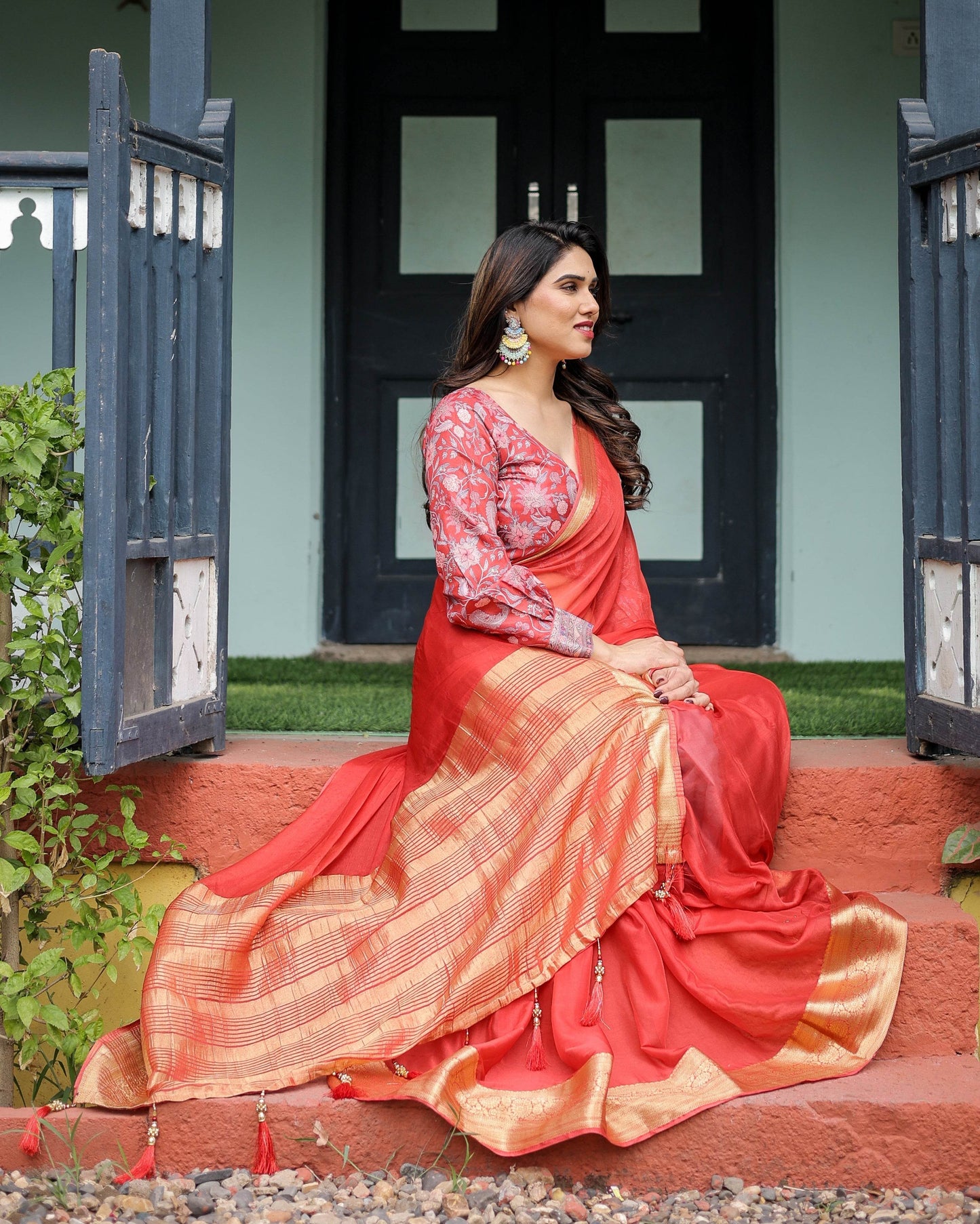 Fiery Red Plain Chiffon Saree with Gold Zari Border, Full-Sleeve Floral Blouse & Tassel Detailing - SEEANS