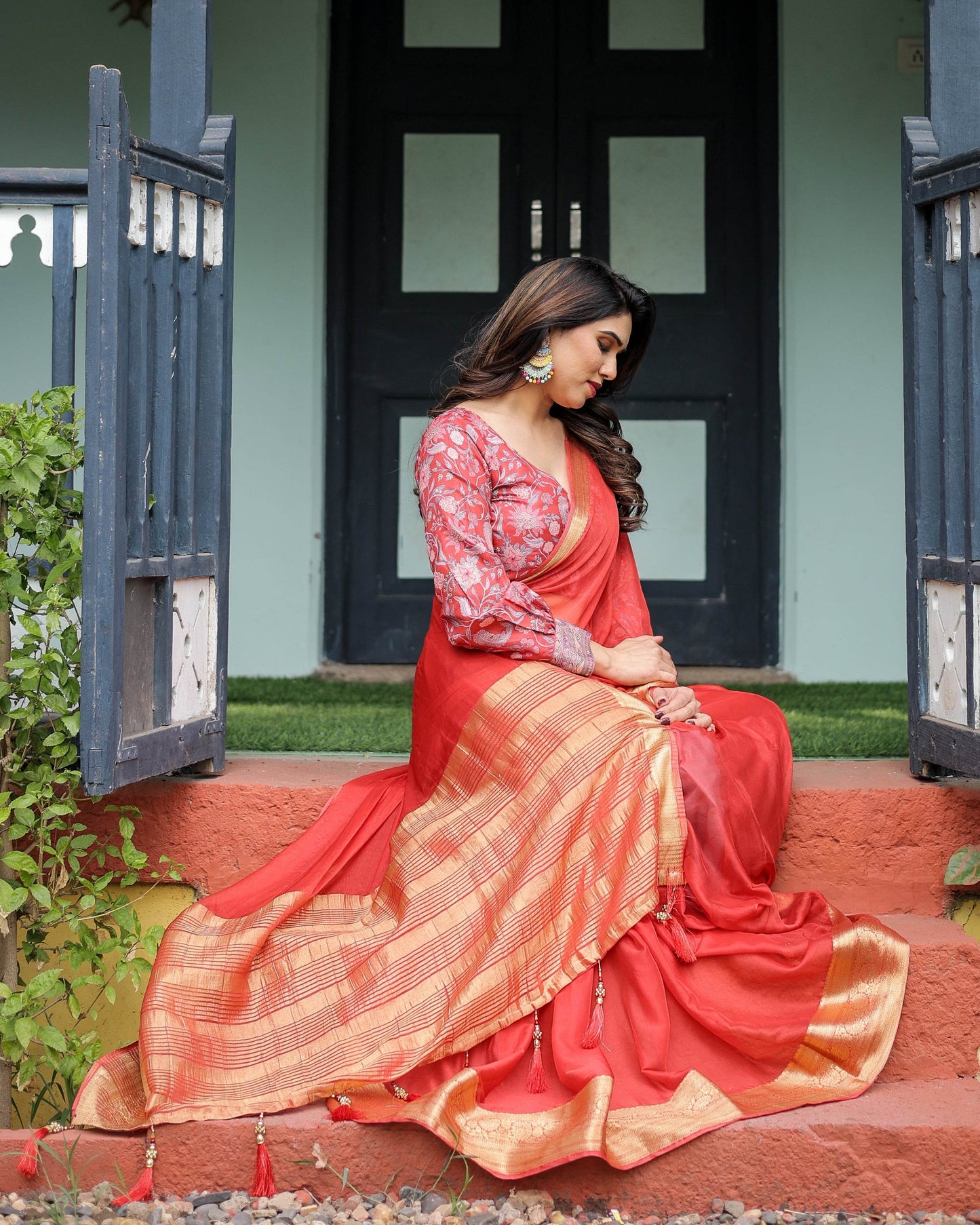 Fiery Red Plain Chiffon Saree with Gold Zari Border, Full-Sleeve Floral Blouse & Tassel Detailing - SEEANS