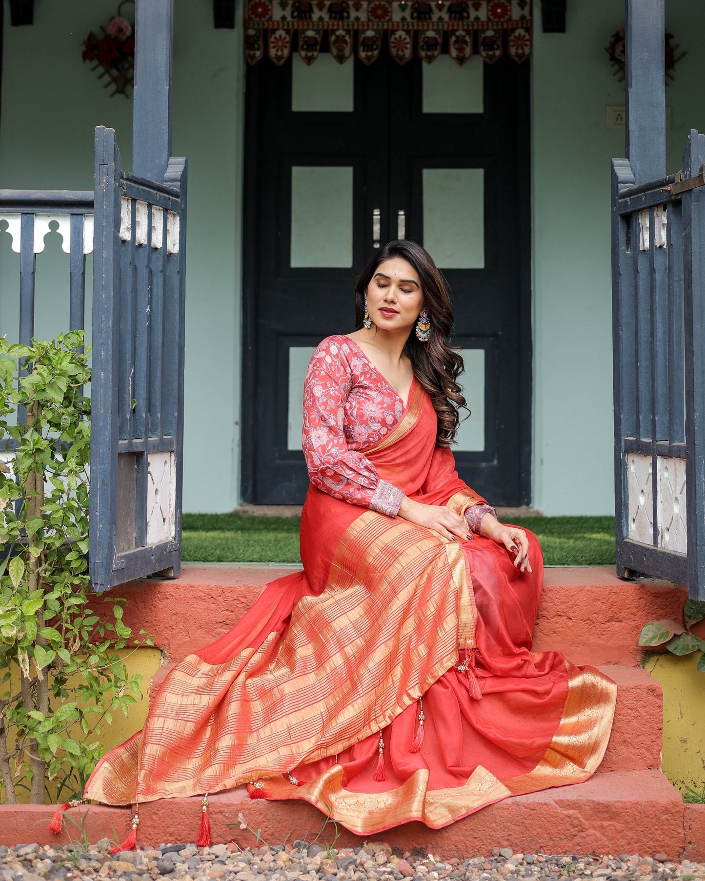 Fiery Red Plain Chiffon Saree with Gold Zari Border, Full-Sleeve Floral Blouse & Tassel Detailing - SEEANS