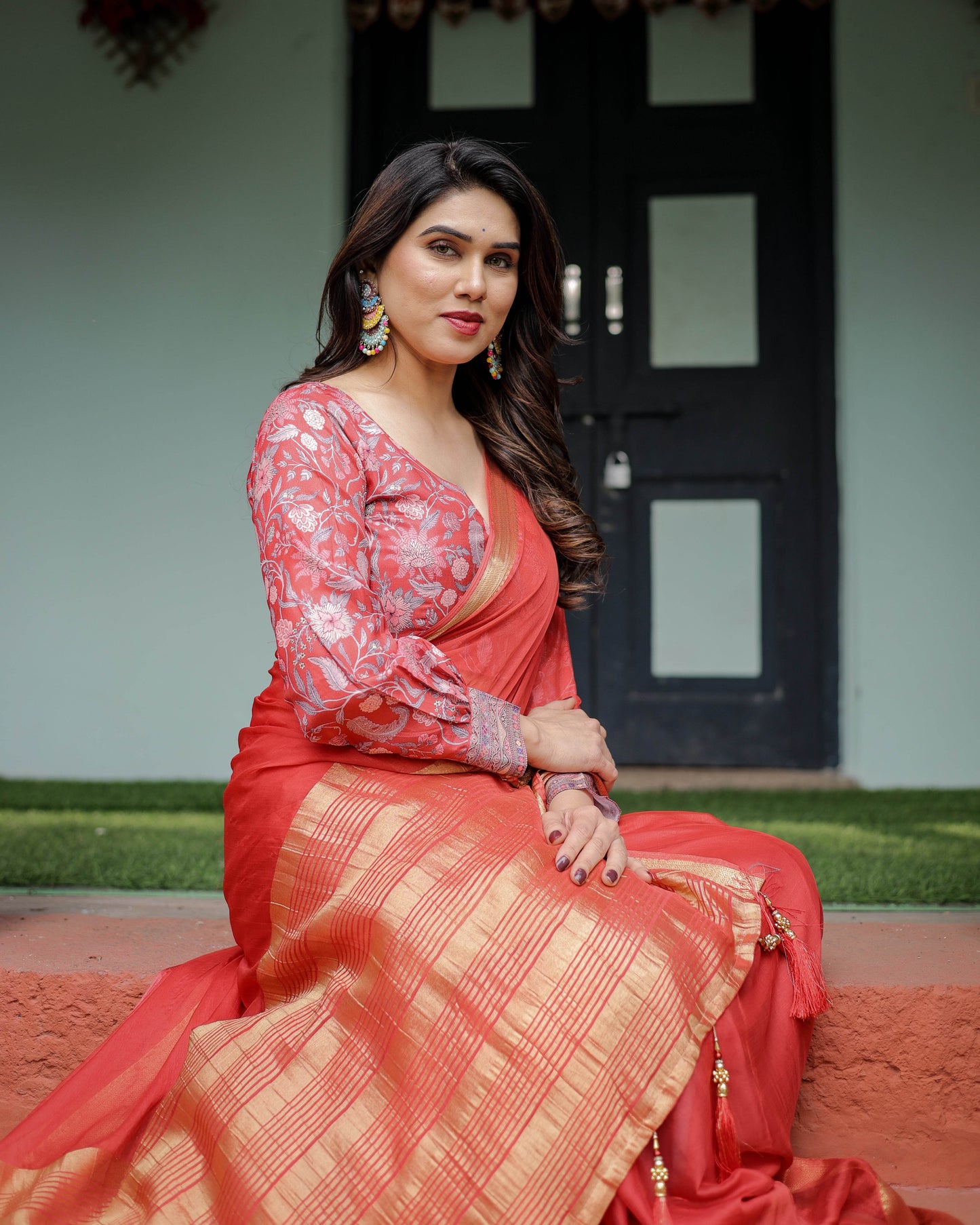 Fiery Red Plain Chiffon Saree with Gold Zari Border, Full-Sleeve Floral Blouse & Tassel Detailing - SEEANS