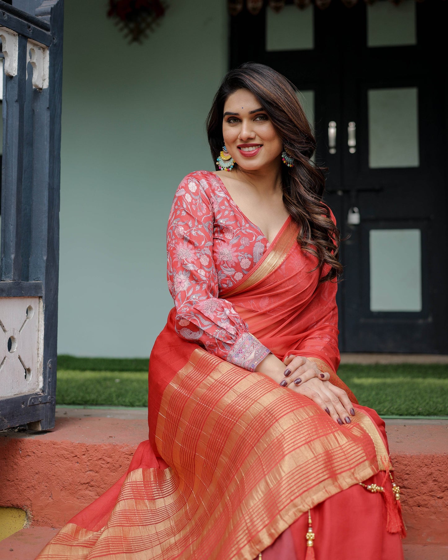 Fiery Red Plain Chiffon Saree with Gold Zari Border, Full-Sleeve Floral Blouse & Tassel Detailing - SEEANS