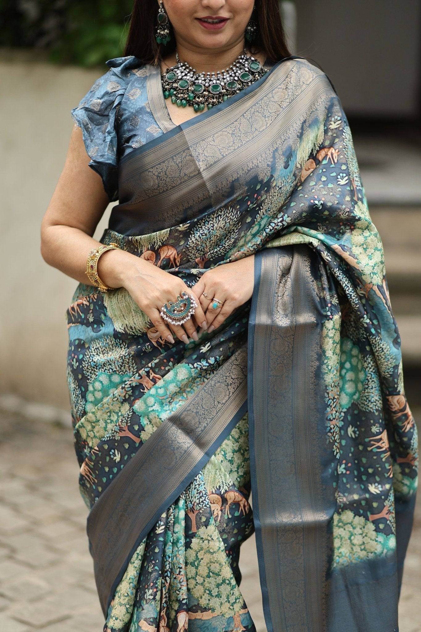 Elegant Teal Blue Banarasi Silk Saree with Forest-Inspired Motifs and Tassels - SEEANS