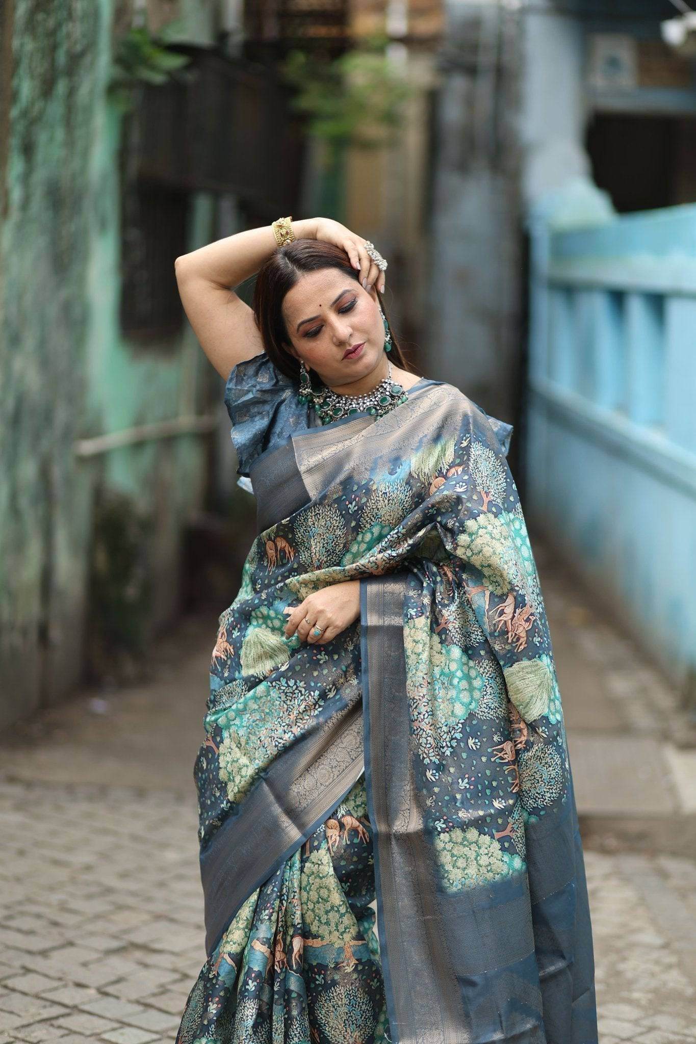 Elegant Teal Blue Banarasi Silk Saree with Forest-Inspired Motifs and Tassels - SEEANS