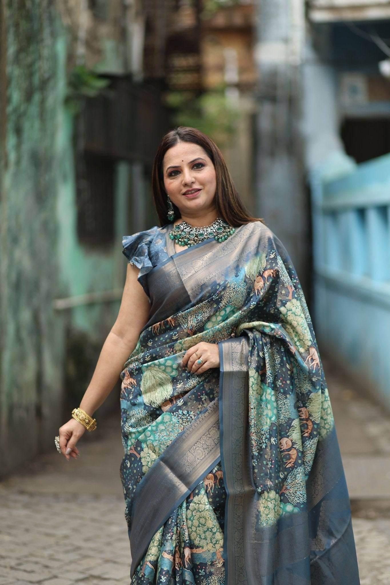 Elegant Teal Blue Banarasi Silk Saree with Forest-Inspired Motifs and Tassels - SEEANS