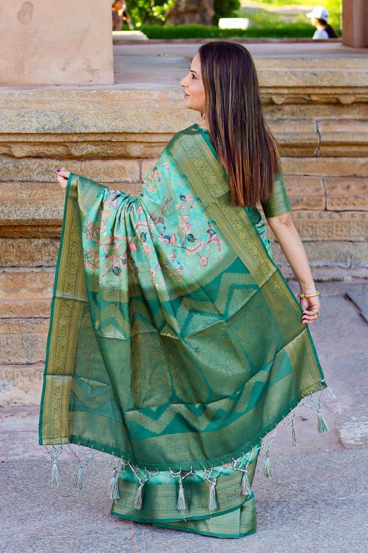 Graceful Emerald Green Banarasi Silk Saree with Floral Zari Accents - SEEANS