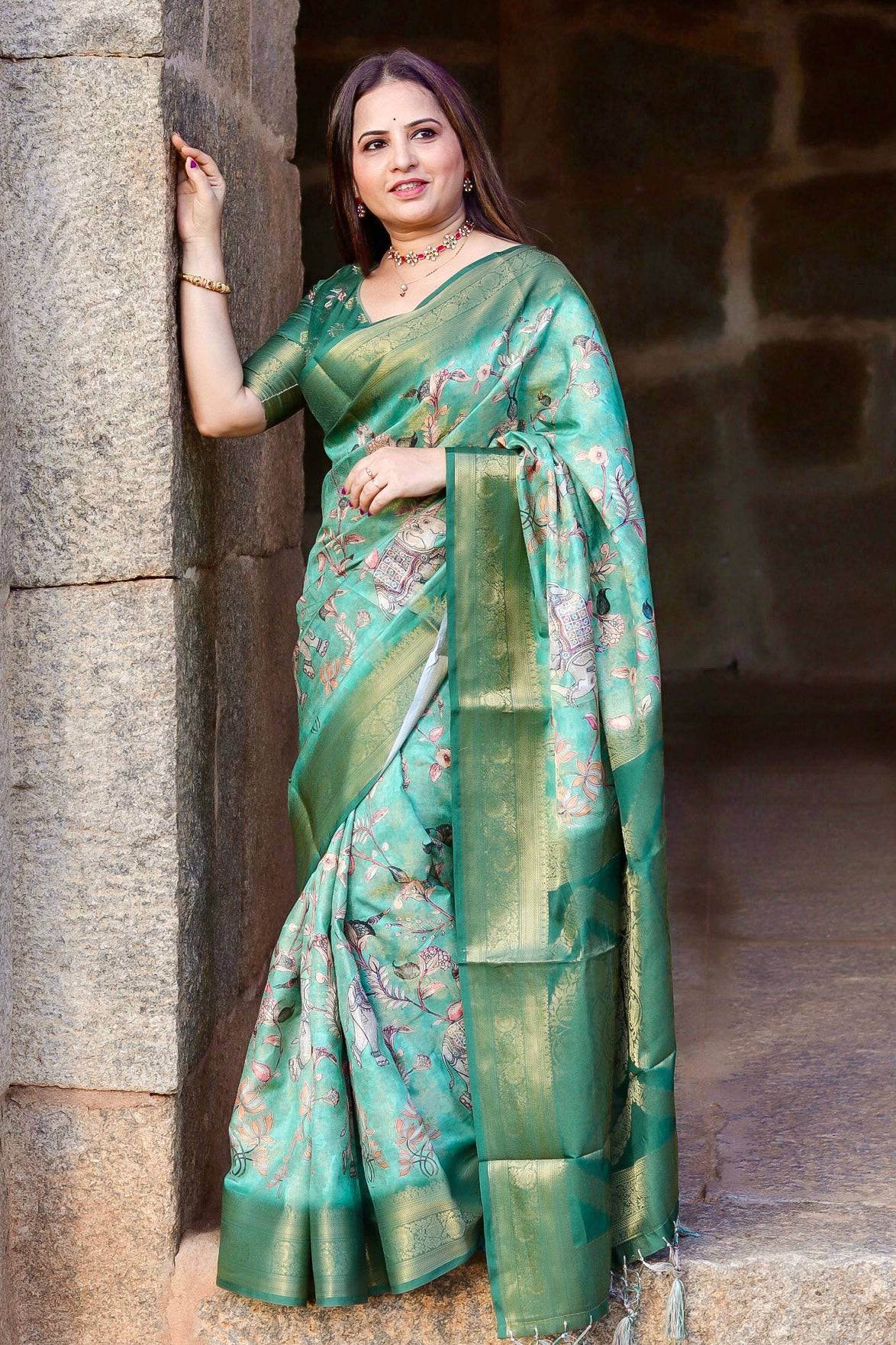 Graceful Emerald Green Banarasi Silk Saree with Floral Zari Accents - SEEANS