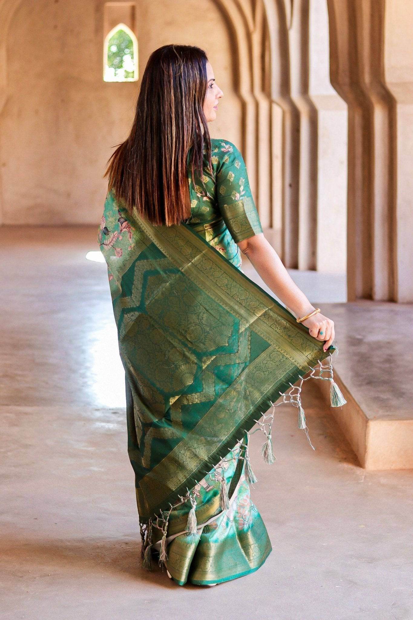 Graceful Emerald Green Banarasi Silk Saree with Floral Zari Accents - SEEANS