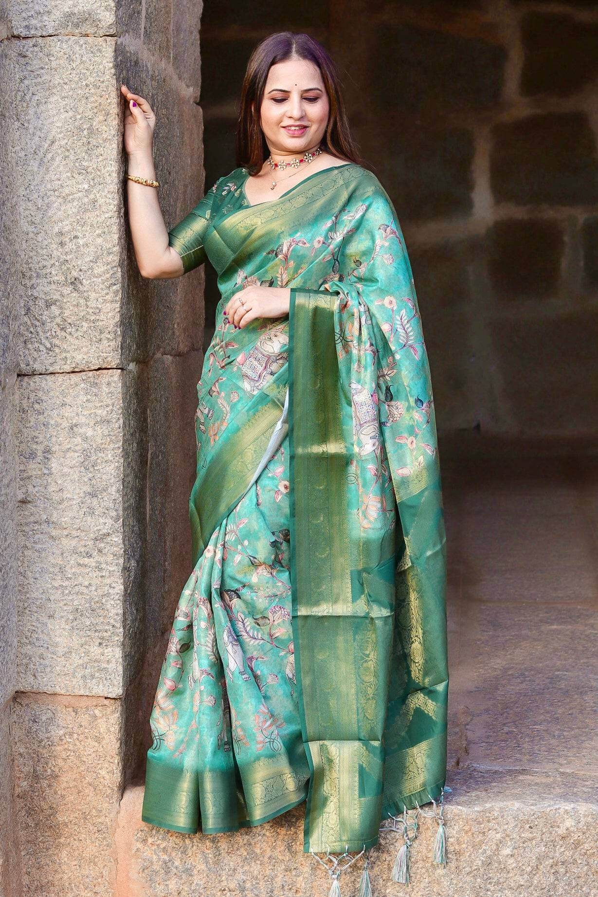 Graceful Emerald Green Banarasi Silk Saree with Floral Zari Accents - SEEANS