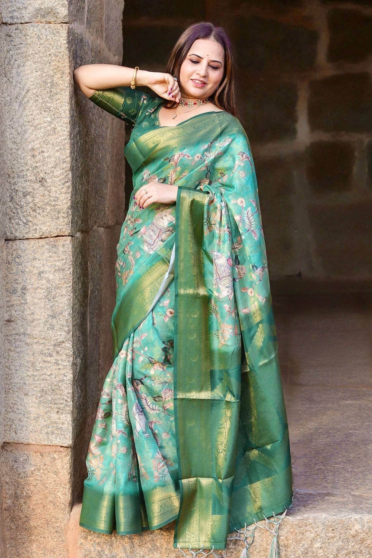 Graceful Emerald Green Banarasi Silk Saree with Floral Zari Accents - SEEANS