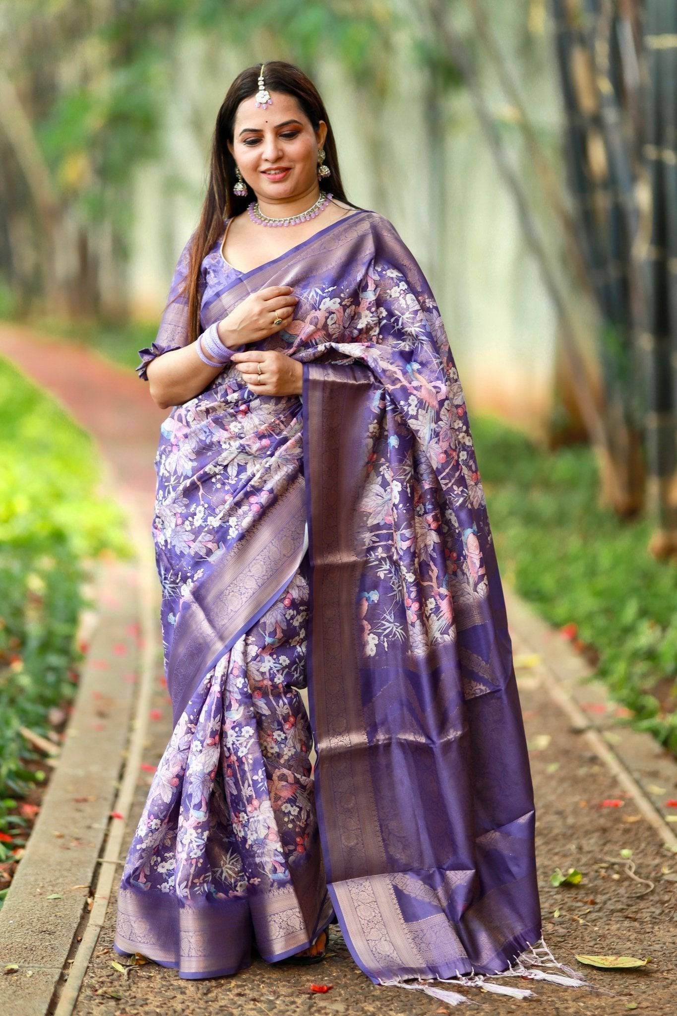 Regal Purple Banarasi Silk Saree with Floral Motifs and Elegant Tassels - SEEANS