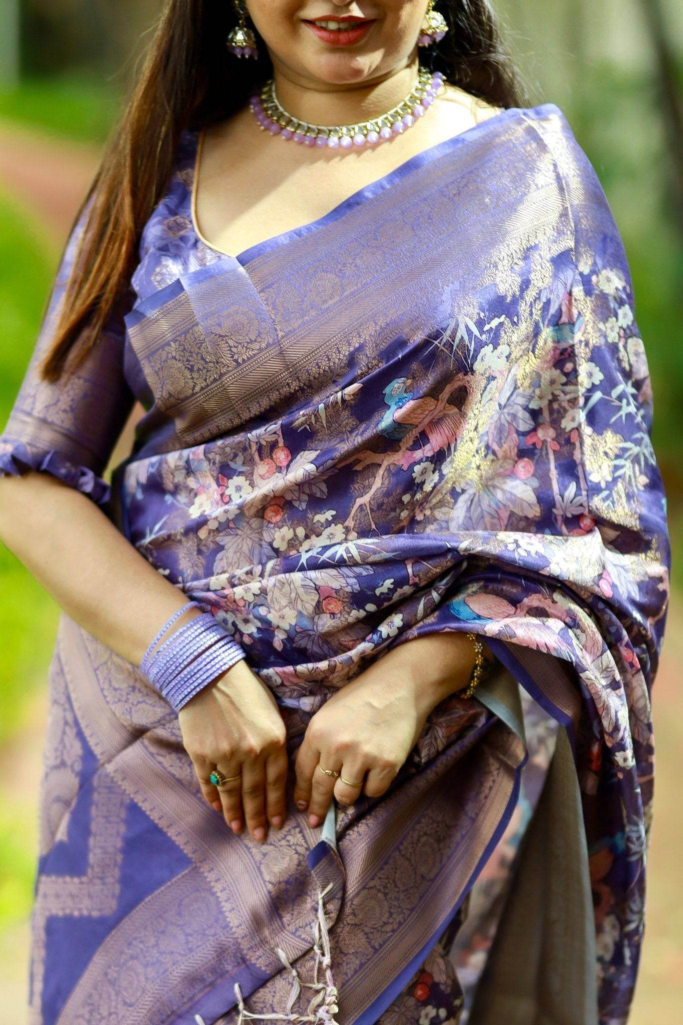 Regal Purple Banarasi Silk Saree with Floral Motifs and Elegant Tassels - SEEANS