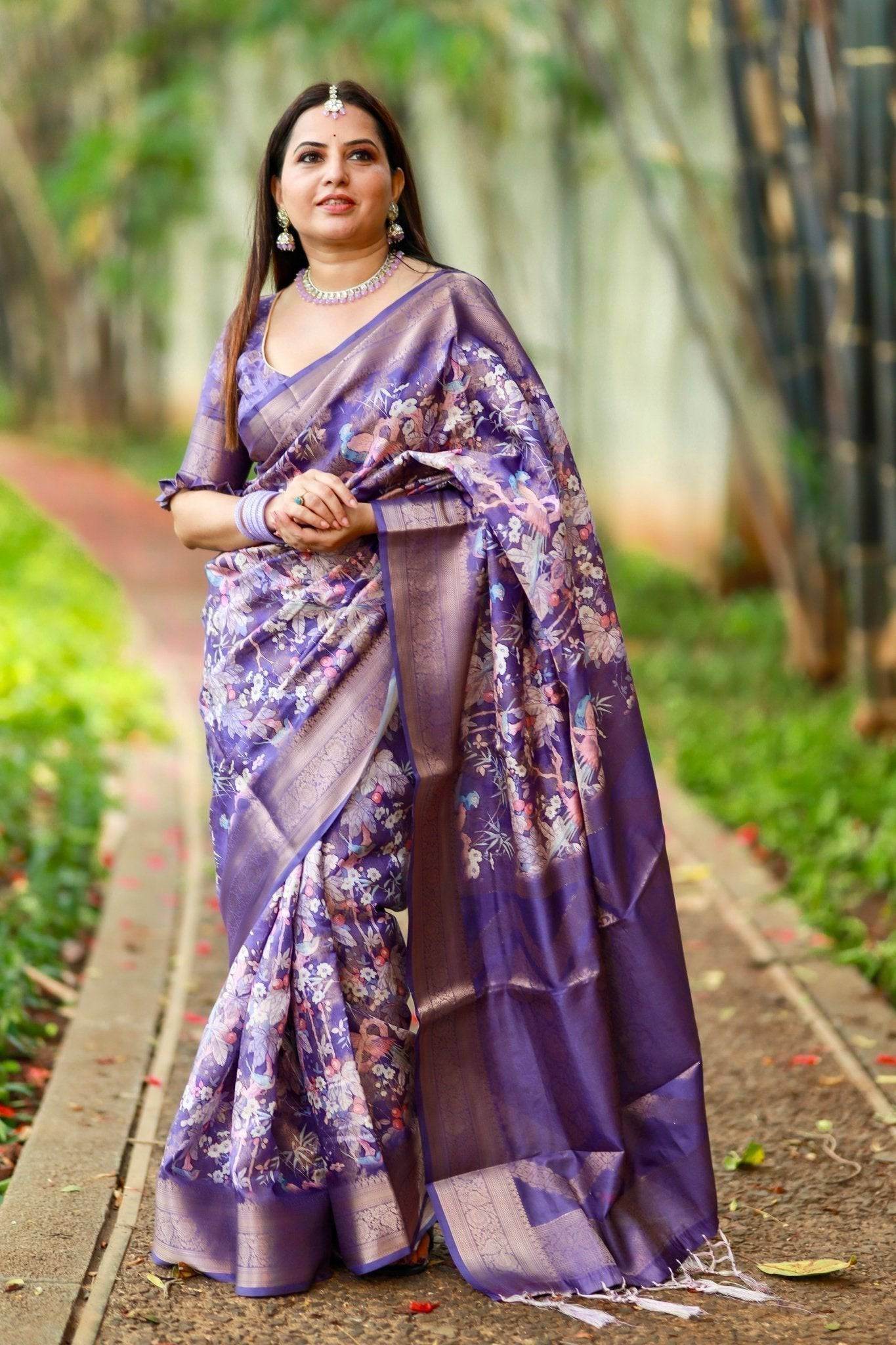 Regal Purple Banarasi Silk Saree with Floral Motifs and Elegant Tassels - SEEANS