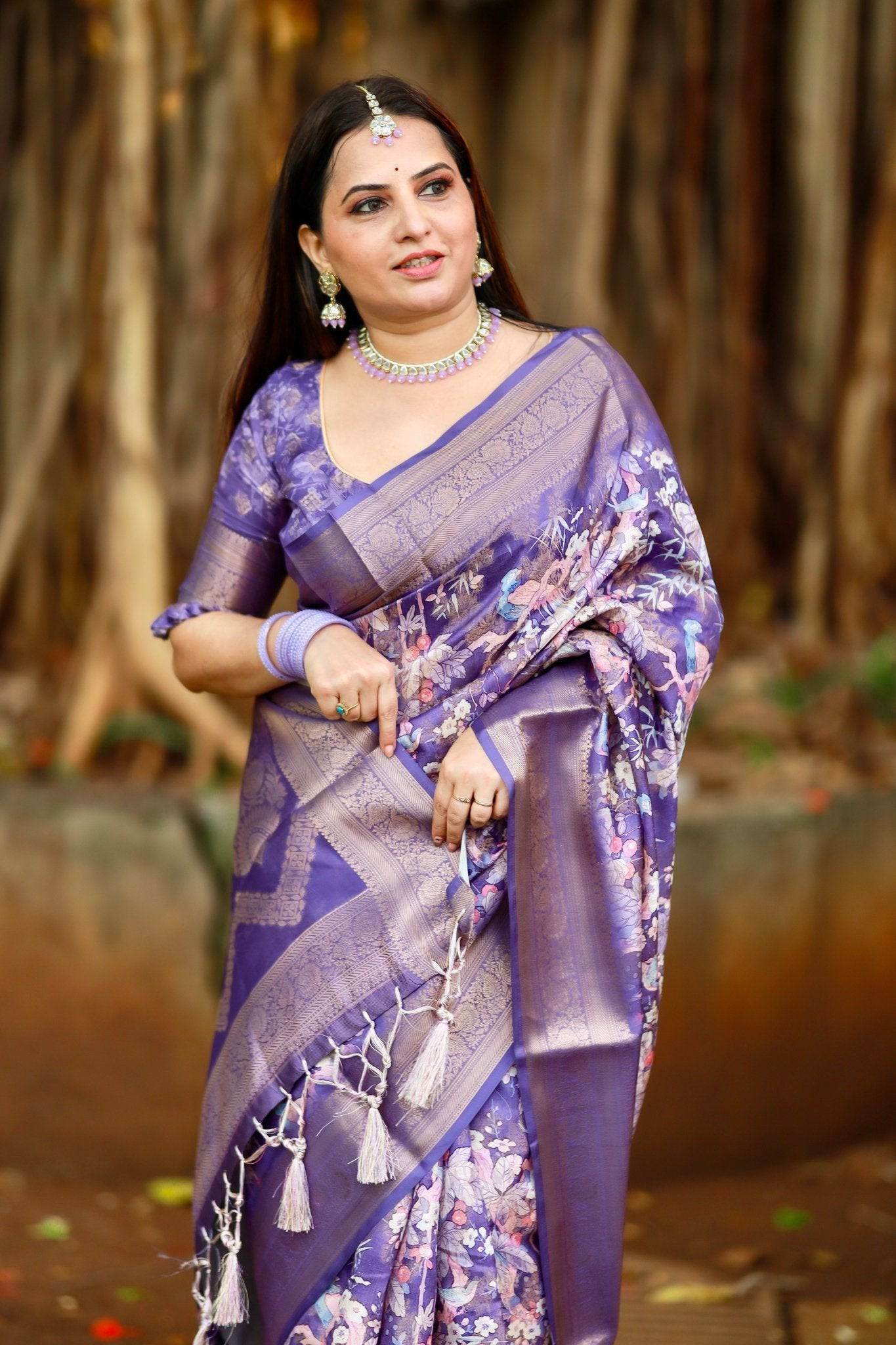 Regal Purple Banarasi Silk Saree with Floral Motifs and Elegant Tassels - SEEANS