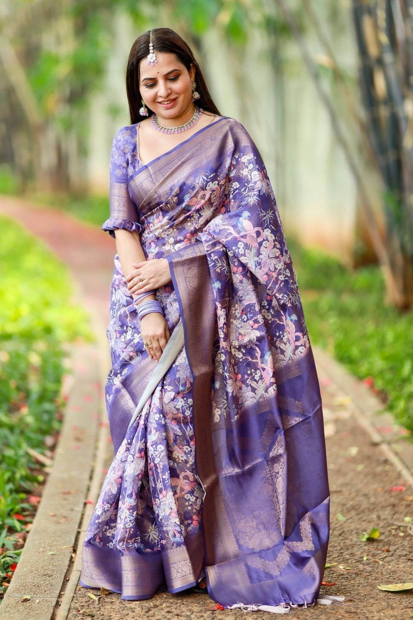 Regal Purple Banarasi Silk Saree with Floral Motifs and Elegant Tassels - SEEANS