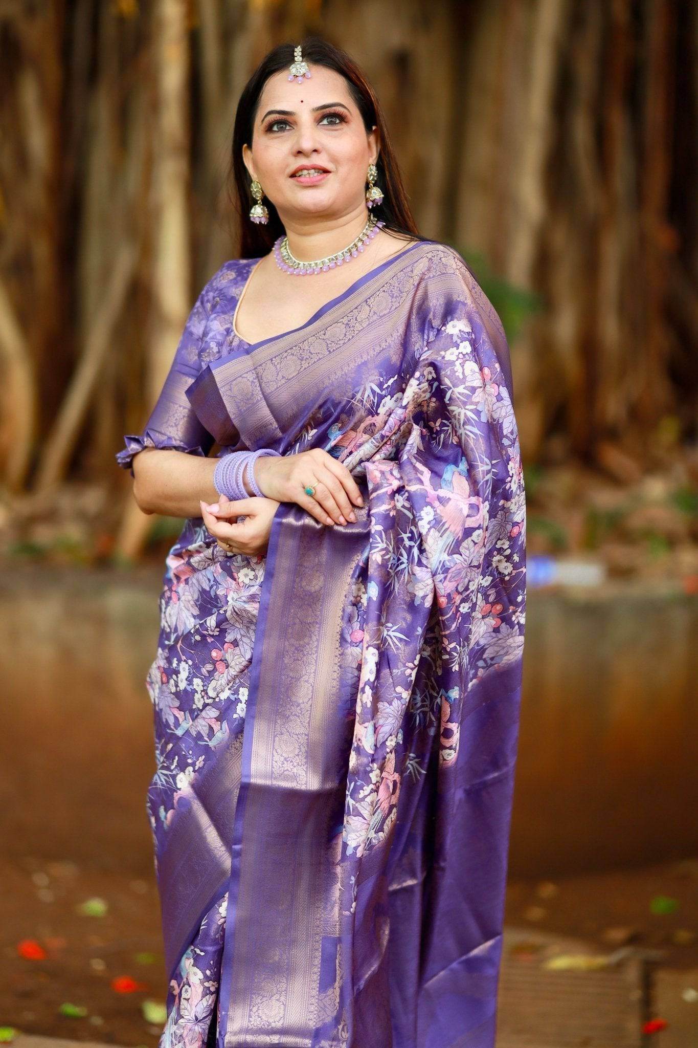 Regal Purple Banarasi Silk Saree with Floral Motifs and Elegant Tassels - SEEANS