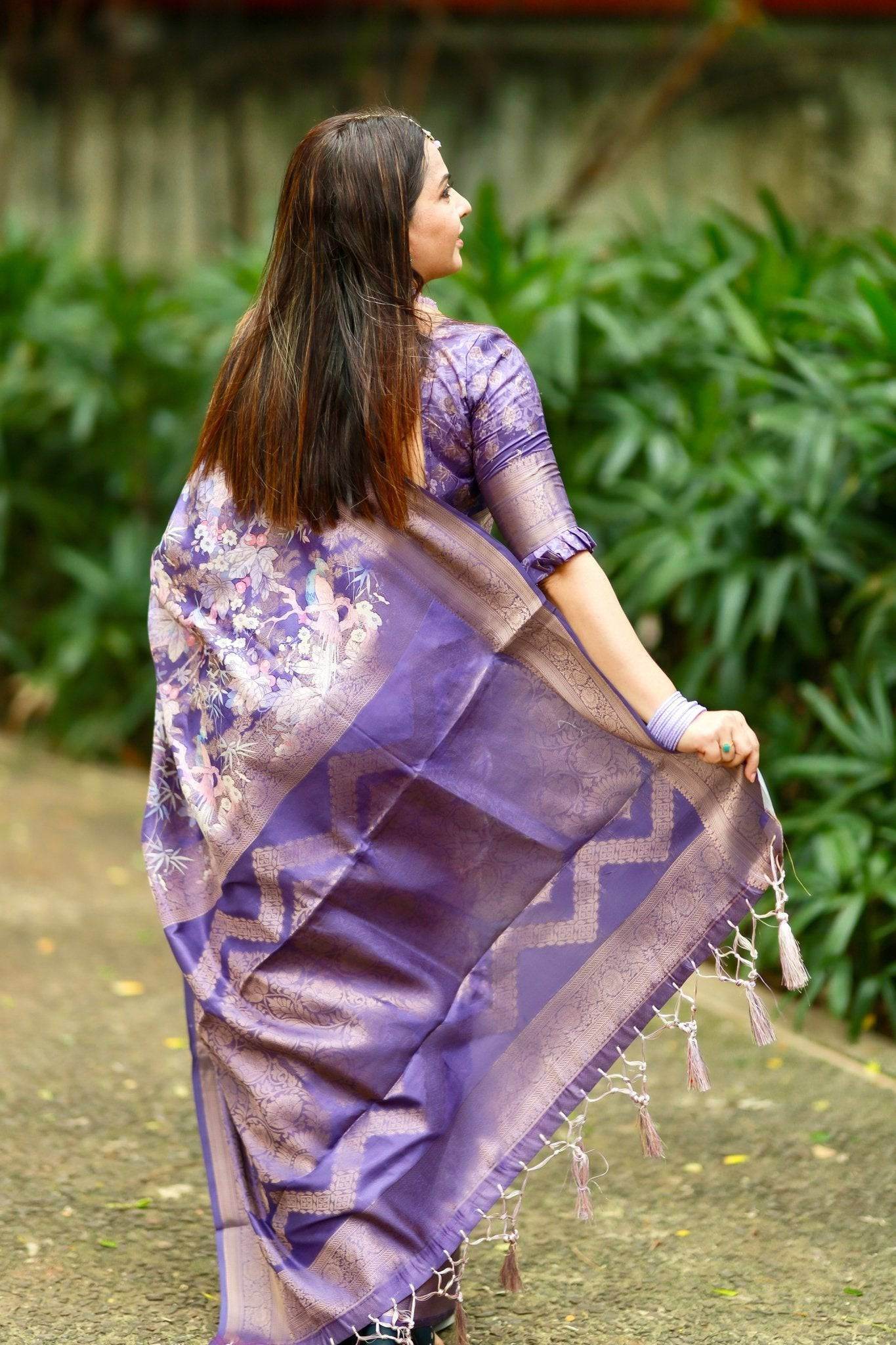 Regal Purple Banarasi Silk Saree with Floral Motifs and Elegant Tassels - SEEANS