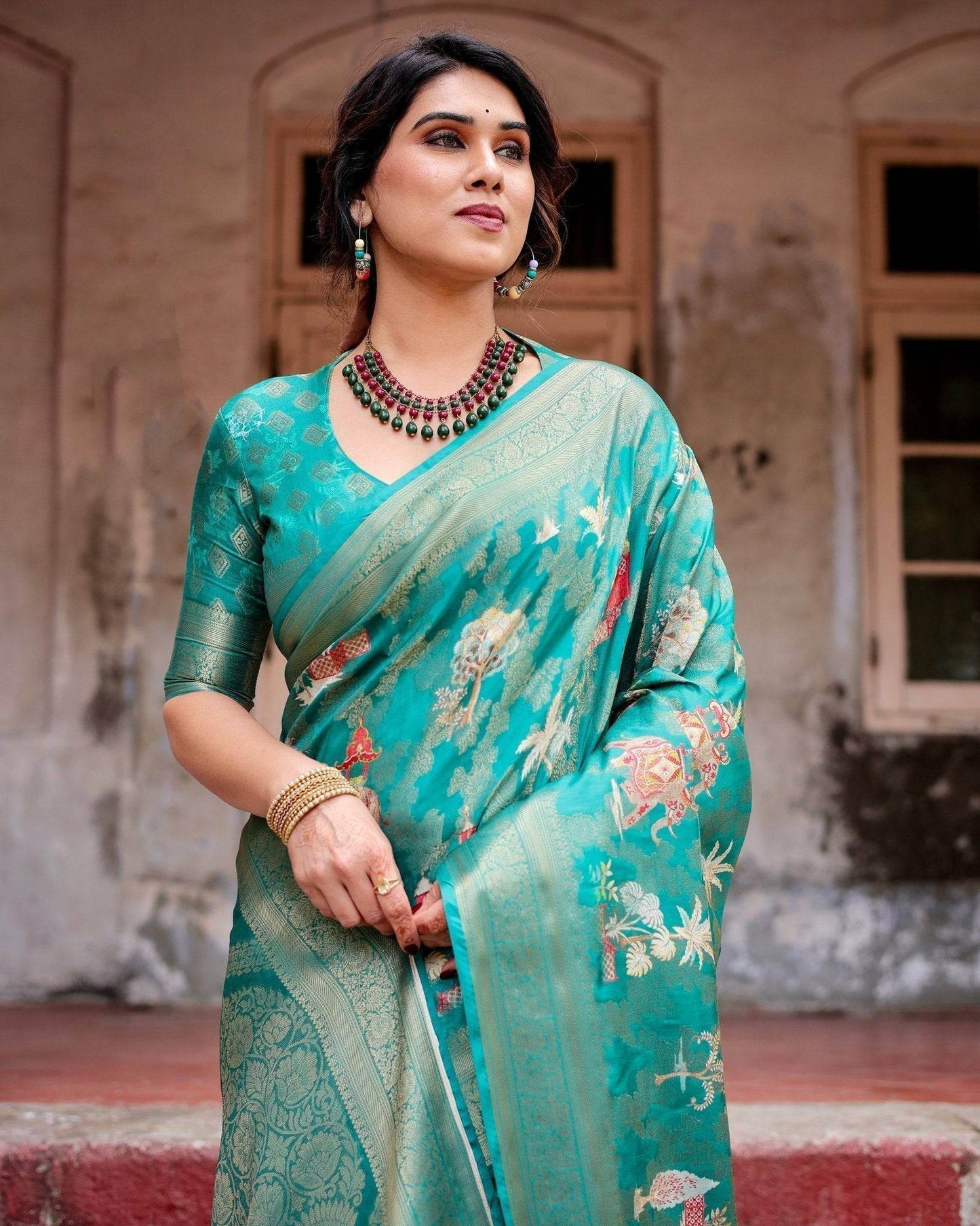 Elegant Teal Green Banarasi Silk Saree with Intricate Zari Weaving and Tassels - SEEANS