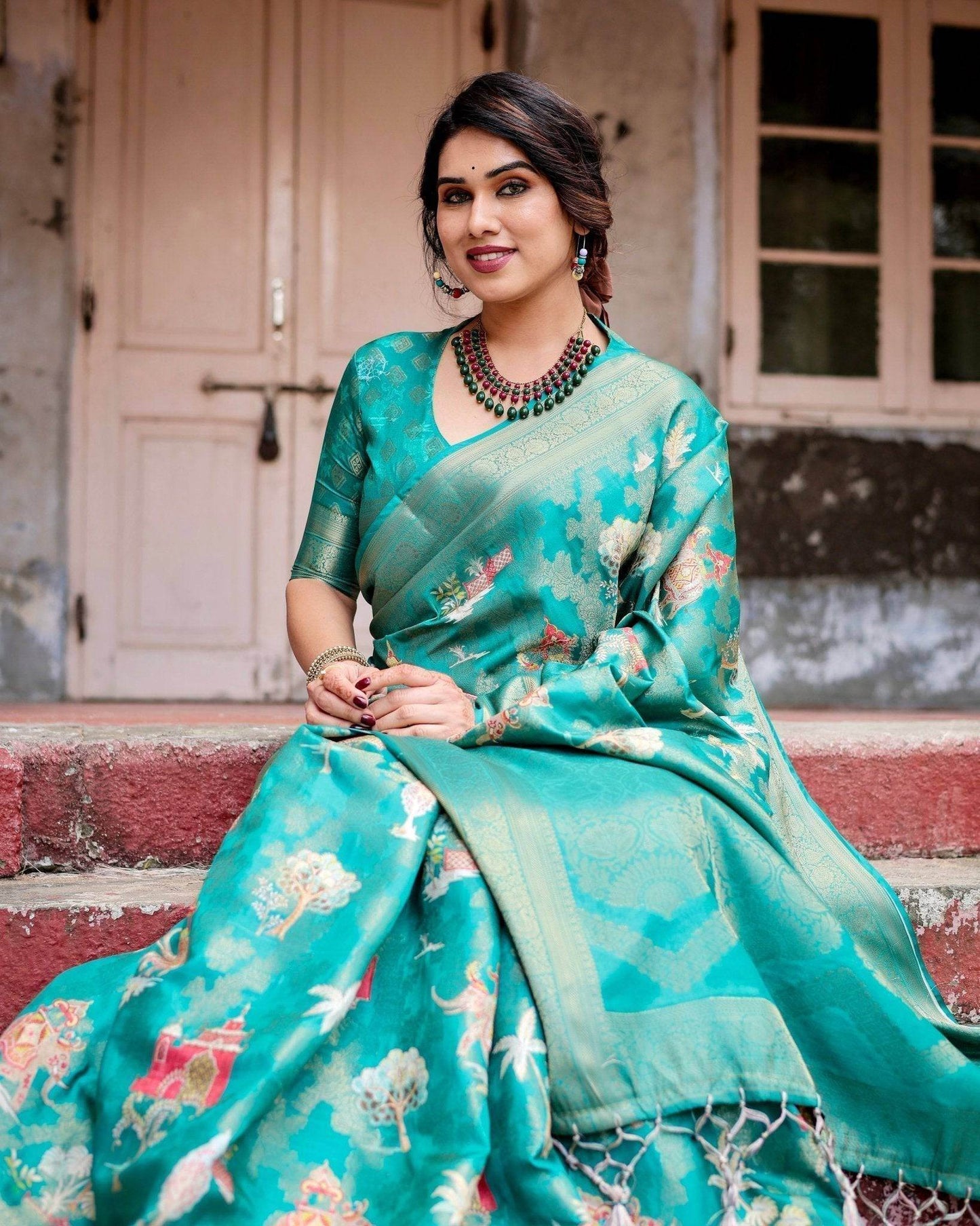 Elegant Teal Green Banarasi Silk Saree with Intricate Zari Weaving and Tassels - SEEANS