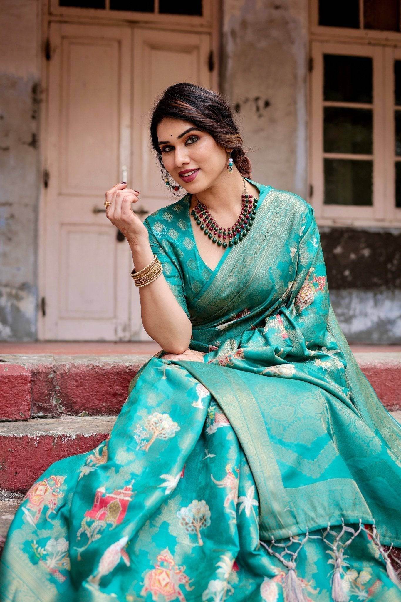 Elegant Teal Green Banarasi Silk Saree with Intricate Zari Weaving and Tassels - SEEANS
