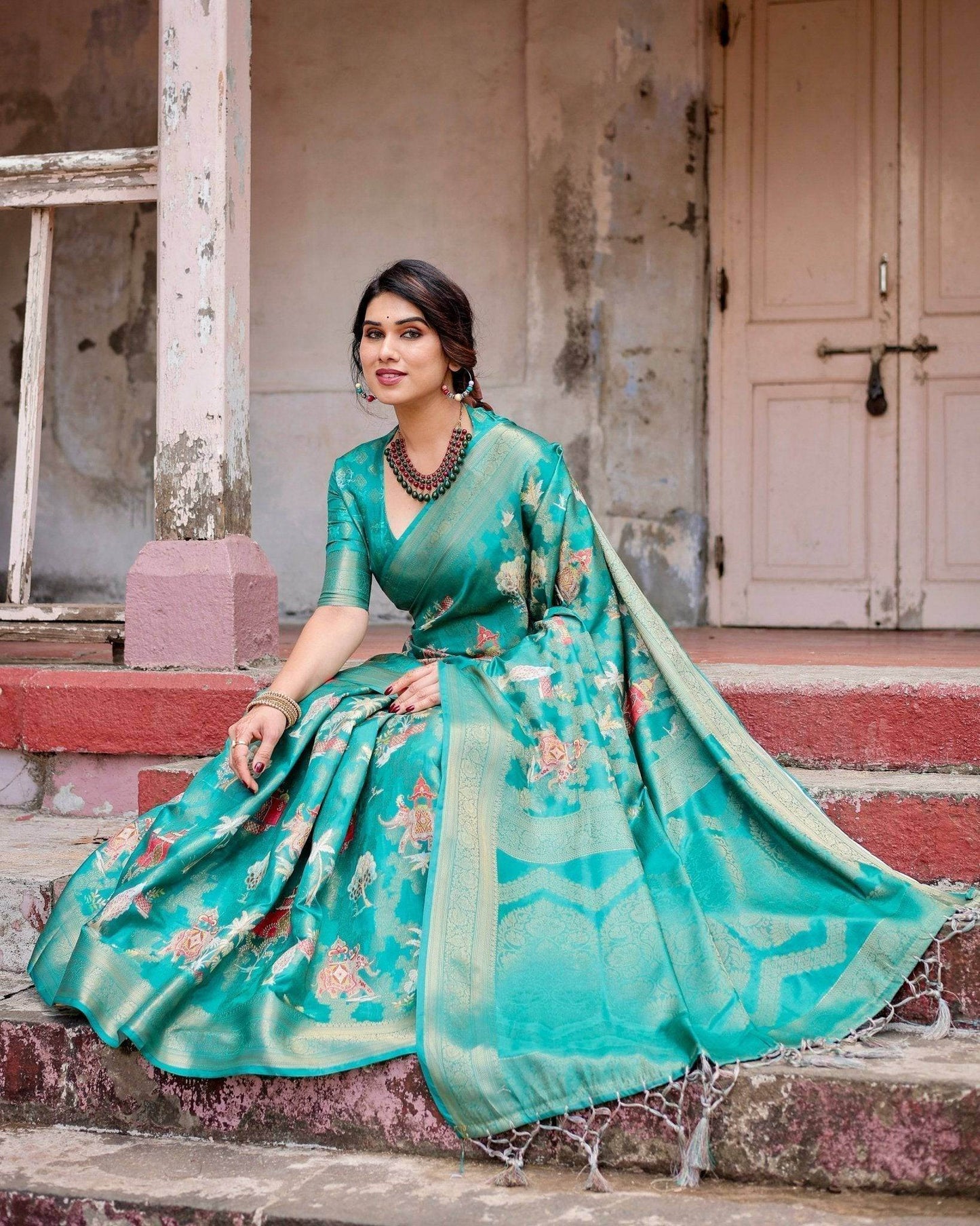Elegant Teal Green Banarasi Silk Saree with Intricate Zari Weaving and Tassels - SEEANS
