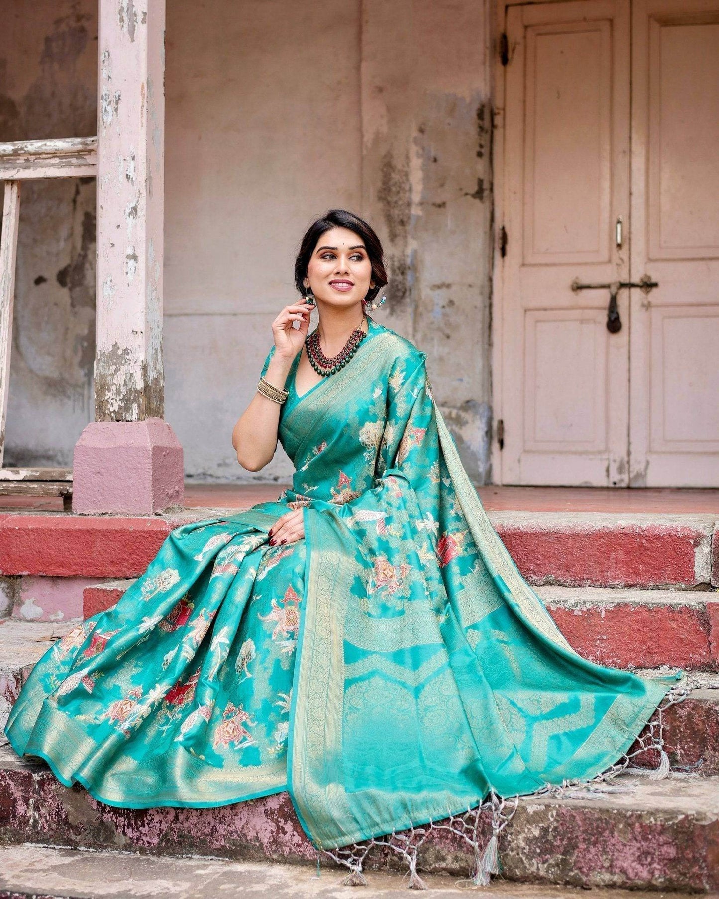 Elegant Teal Green Banarasi Silk Saree with Intricate Zari Weaving and Tassels - SEEANS