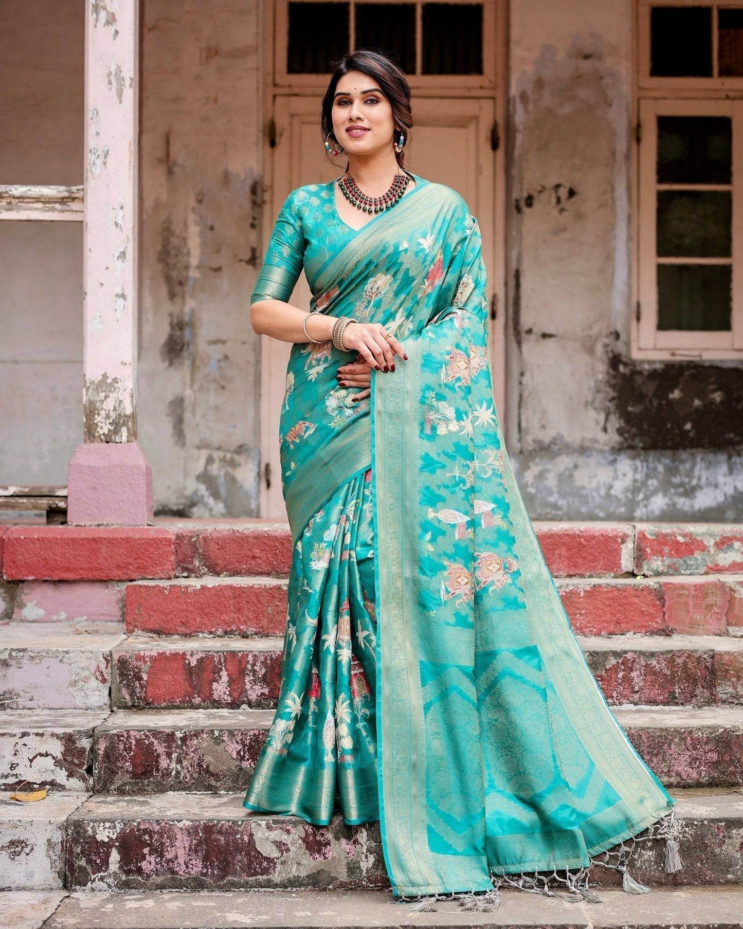 Elegant Teal Green Banarasi Silk Saree with Intricate Zari Weaving and Tassels - SEEANS