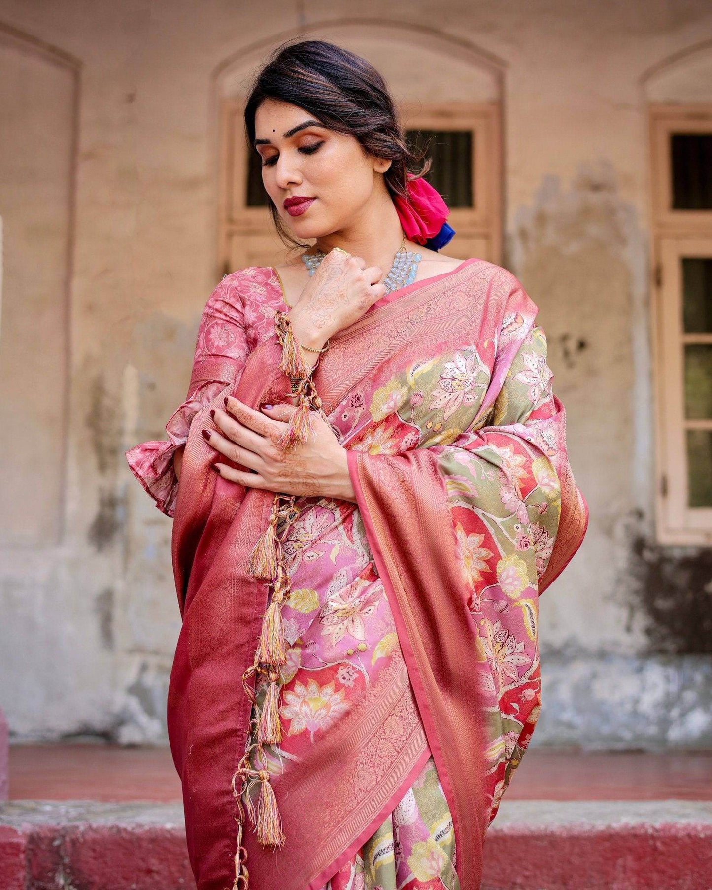Graceful Peach and Pink Banarasi Silk Saree with Zari Weave and Tassels - SEEANS