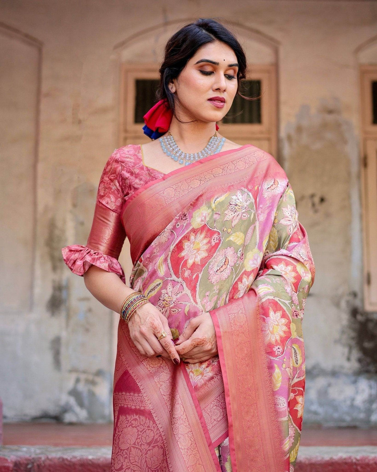 Graceful Peach and Pink Banarasi Silk Saree with Zari Weave and Tassels - SEEANS