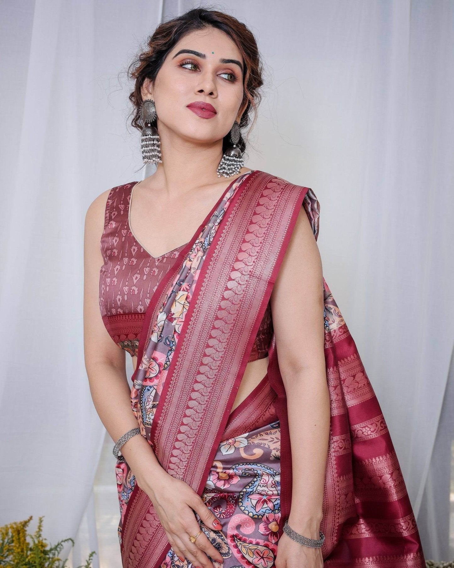 Luxurious Maroon Banarasi Silk Saree with Paisley Print and Tassels - SEEANS