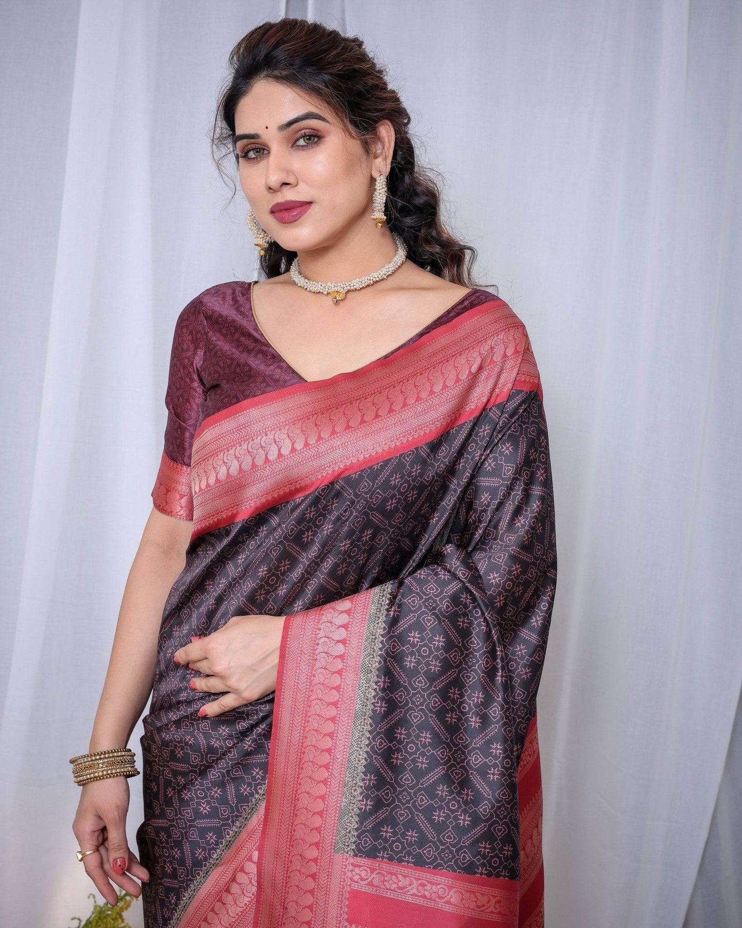 Majestic Black Banarasi Silk Saree with Rose Gold Border and Tassels - SEEANS