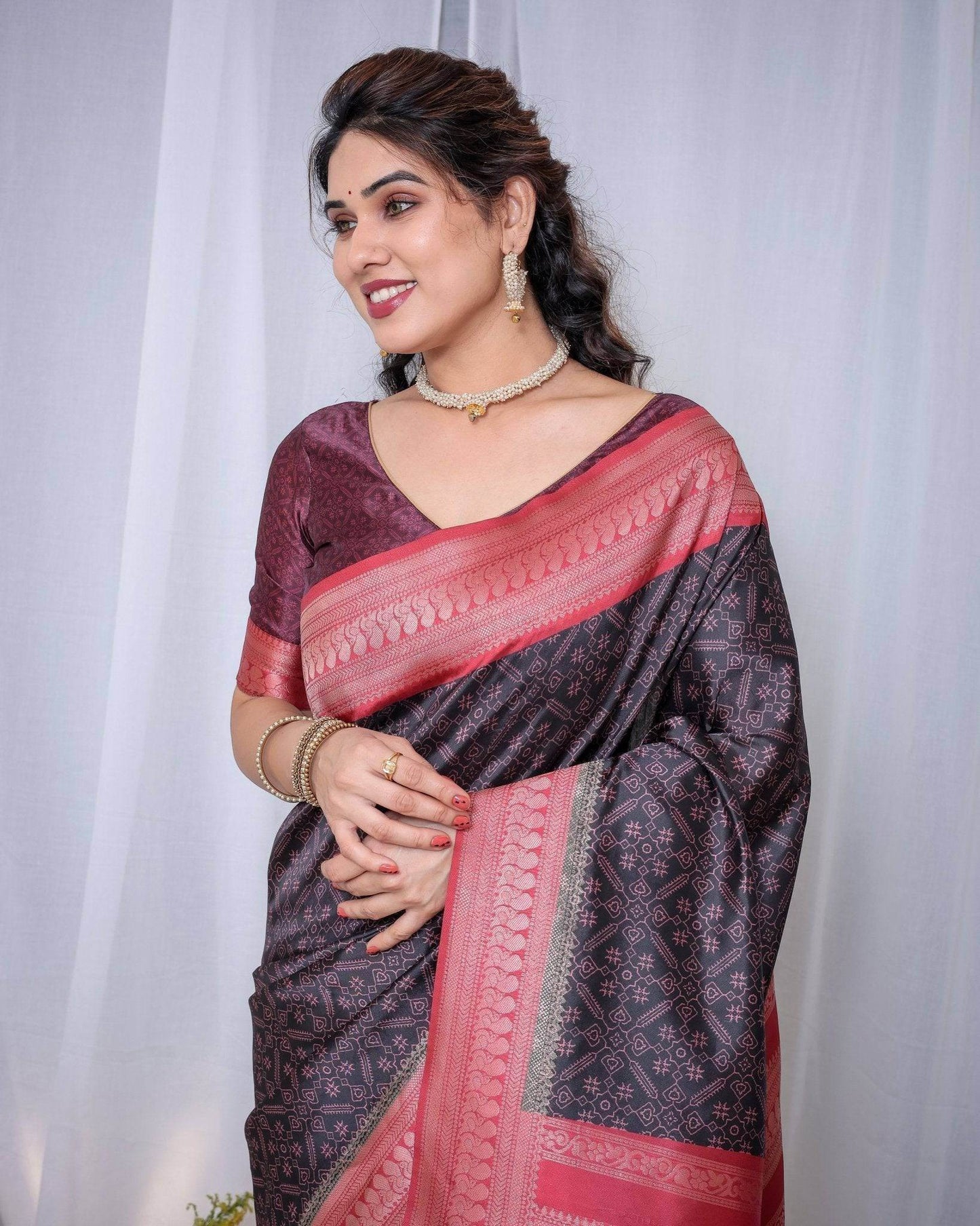 Majestic Black Banarasi Silk Saree with Rose Gold Border and Tassels - SEEANS