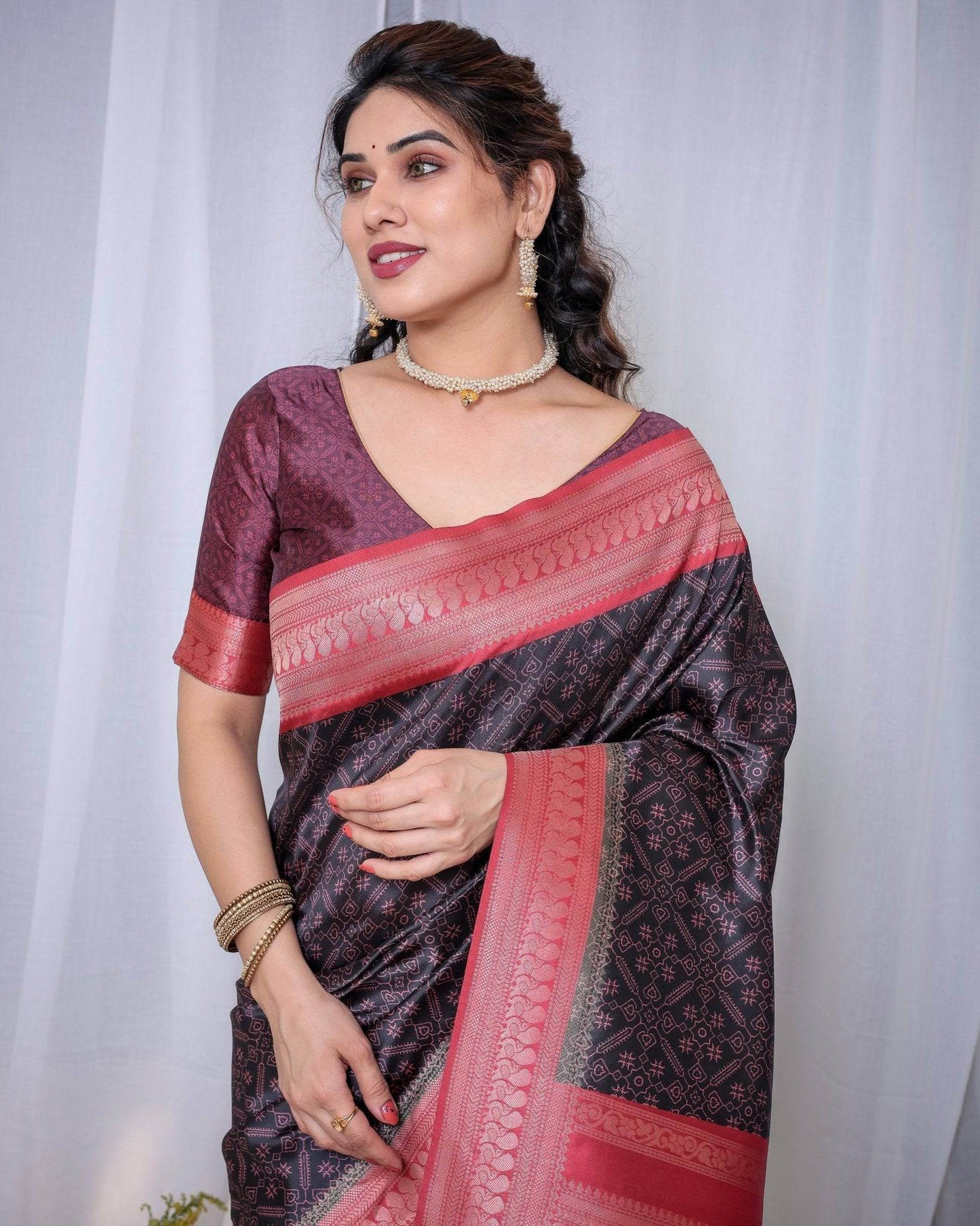 Majestic Black Banarasi Silk Saree with Rose Gold Border and Tassels - SEEANS