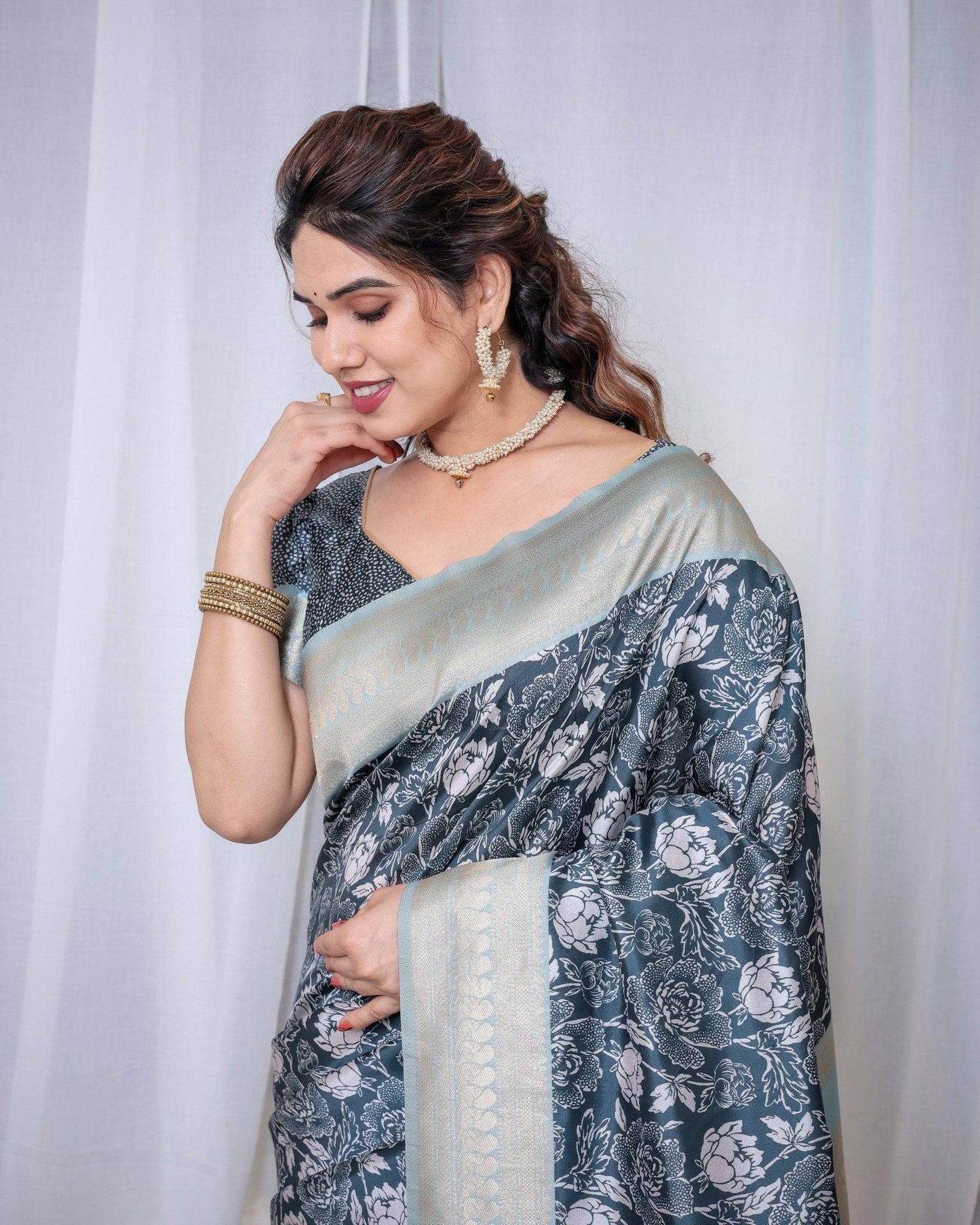 Timeless Blue and Silver Banarasi Silk Saree with Floral Design and Tassels - SEEANS