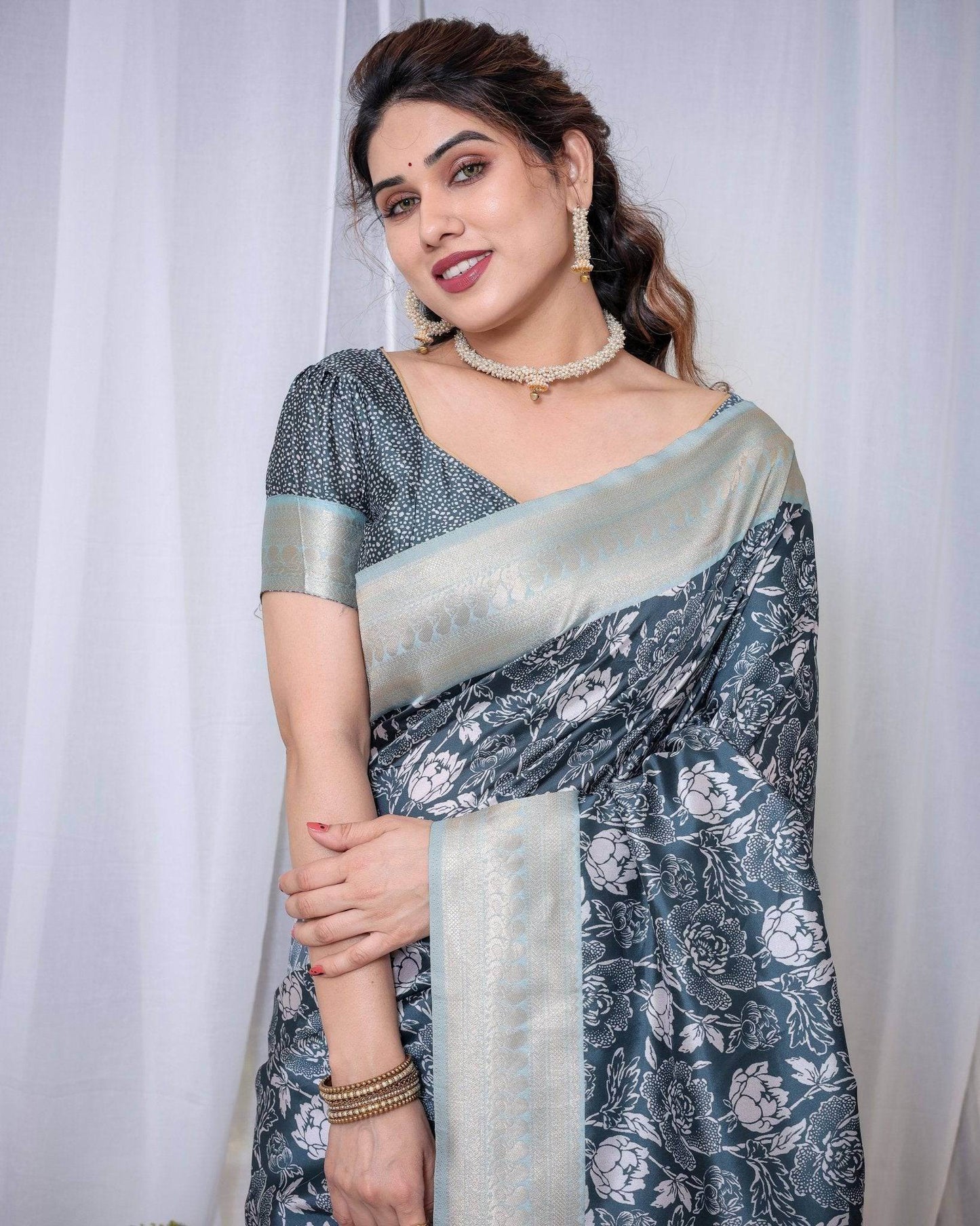 Timeless Blue and Silver Banarasi Silk Saree with Floral Design and Tassels - SEEANS