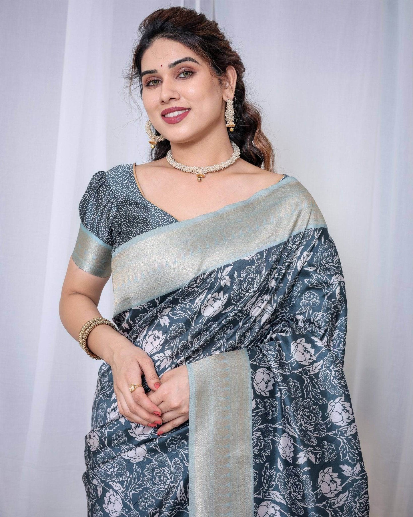 Timeless Blue and Silver Banarasi Silk Saree with Floral Design and Tassels - SEEANS