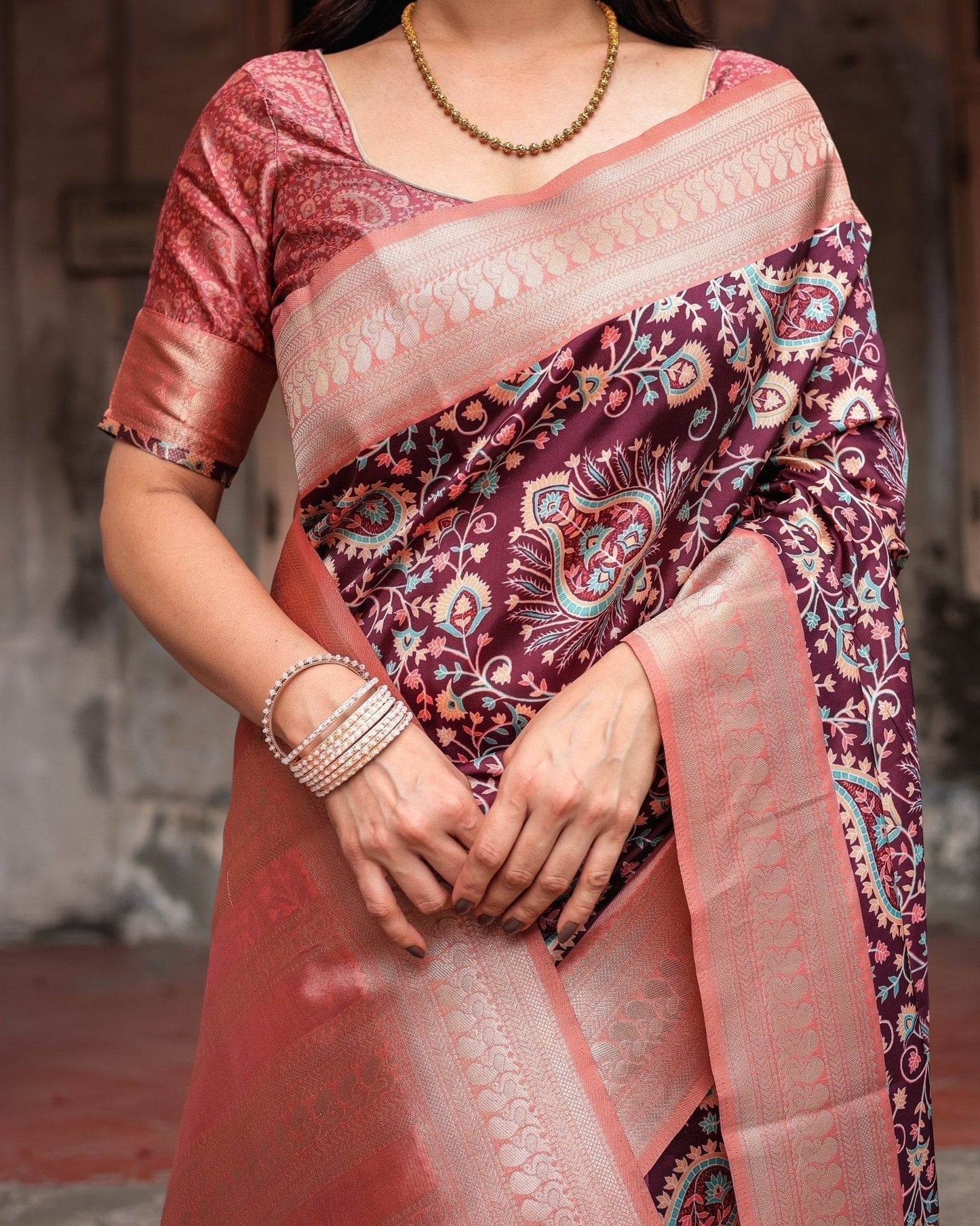 Maroon Banarasi Silk Saree with Peach Zari Border and Paisley Motifs - SEEANS