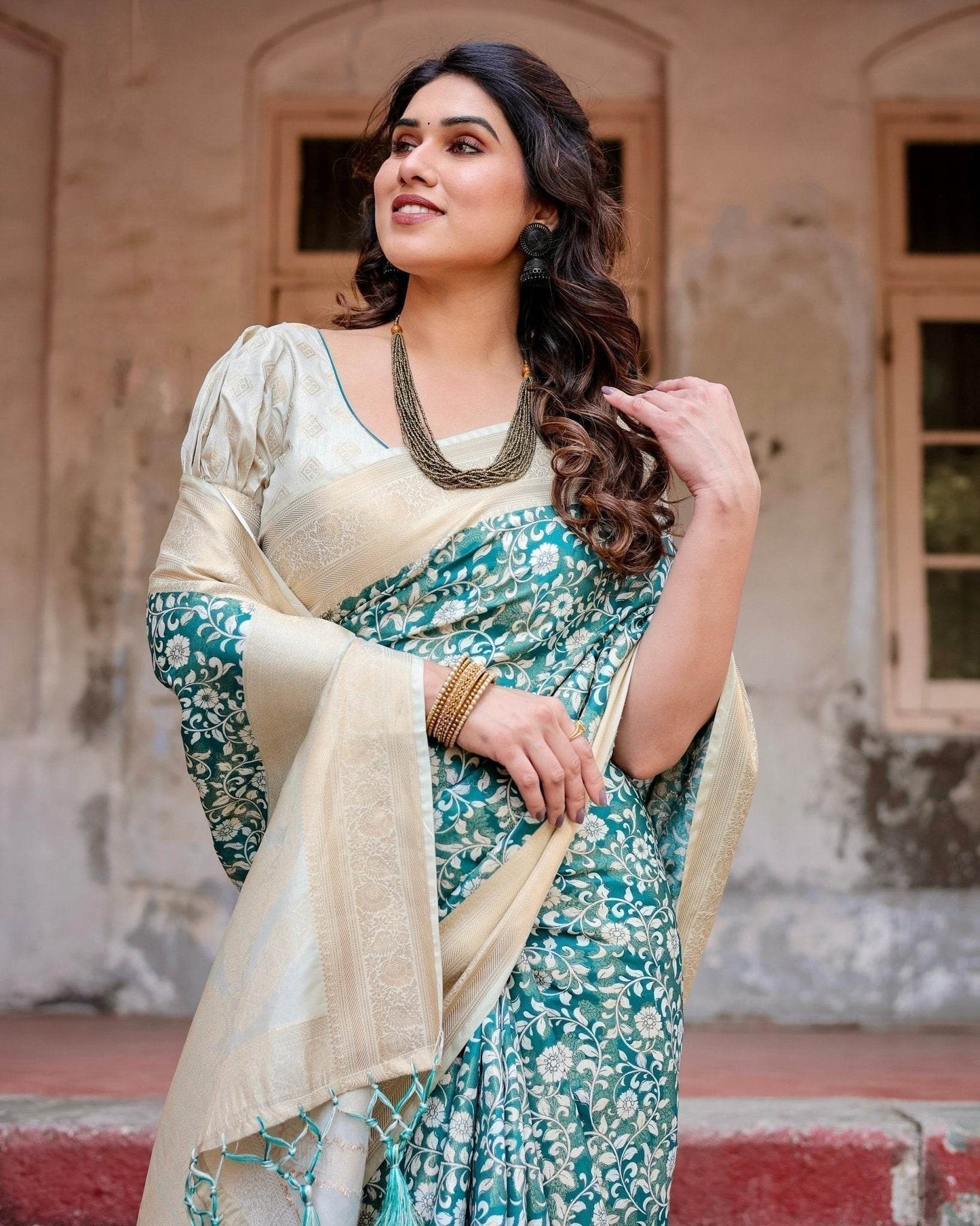 Teal and Cream Floral Banarasi Silk Saree with Zari Weave and Tassel-Accented Pallu - SEEANS