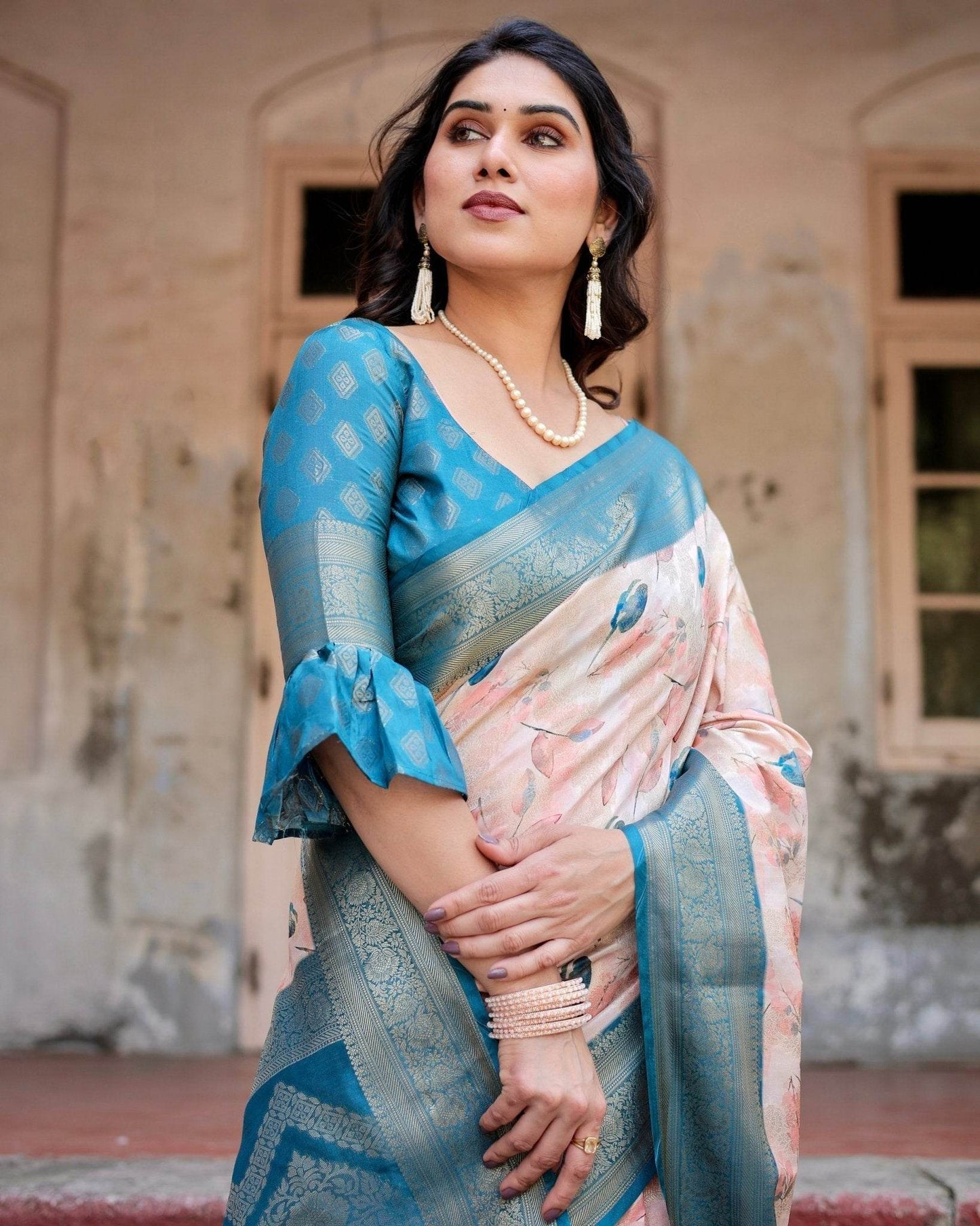 Peach and Teal Floral Digital Print Banarasi Silk Saree with Zari Weave and Tassel-Adorned Pallu - SEEANS