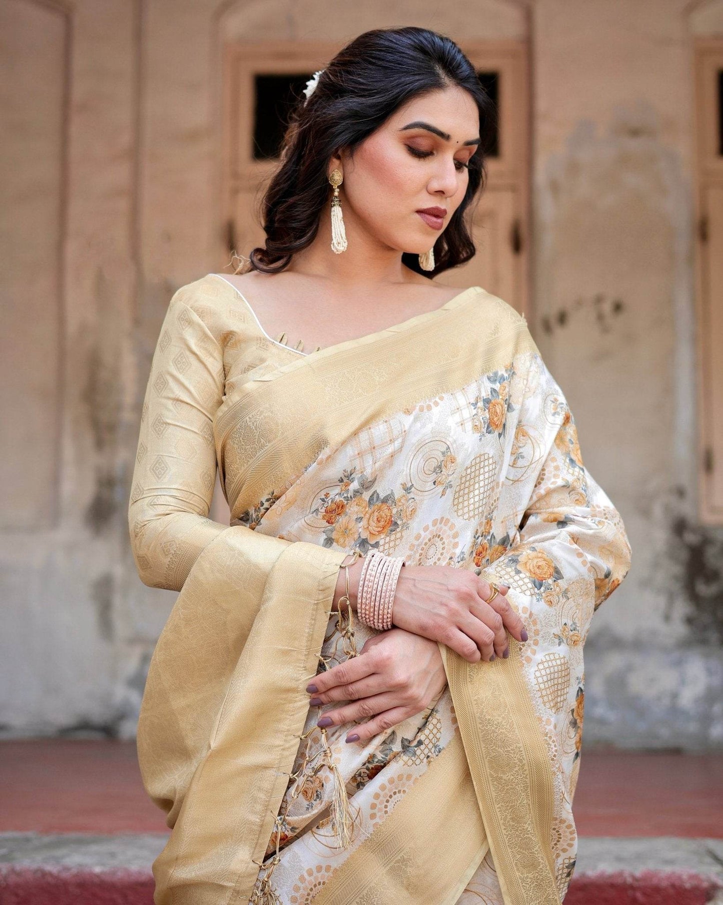 Ivory and Gold Banarasi Silk Saree with Floral Print, Zari Border, and Tassels - SEEANS