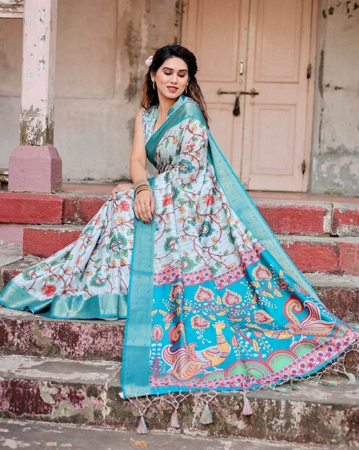 Sky Blue Tussar Silk Saree with Multicolor Floral Design and Zari Paisley Border - SEEANS