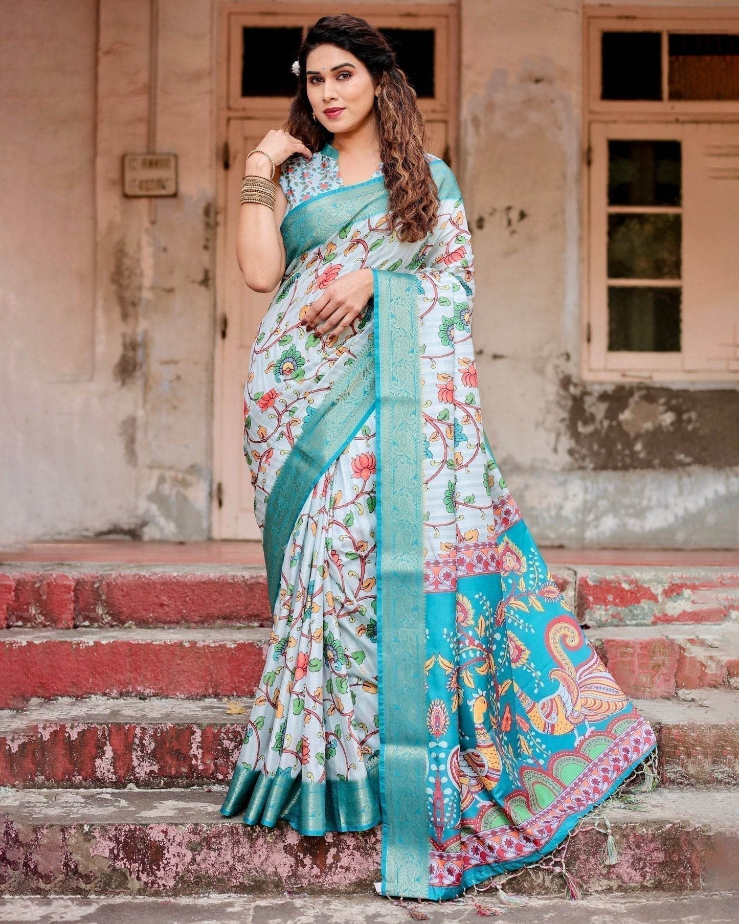 Sky Blue Tussar Silk Saree with Multicolor Floral Design and Zari Paisley Border - SEEANS